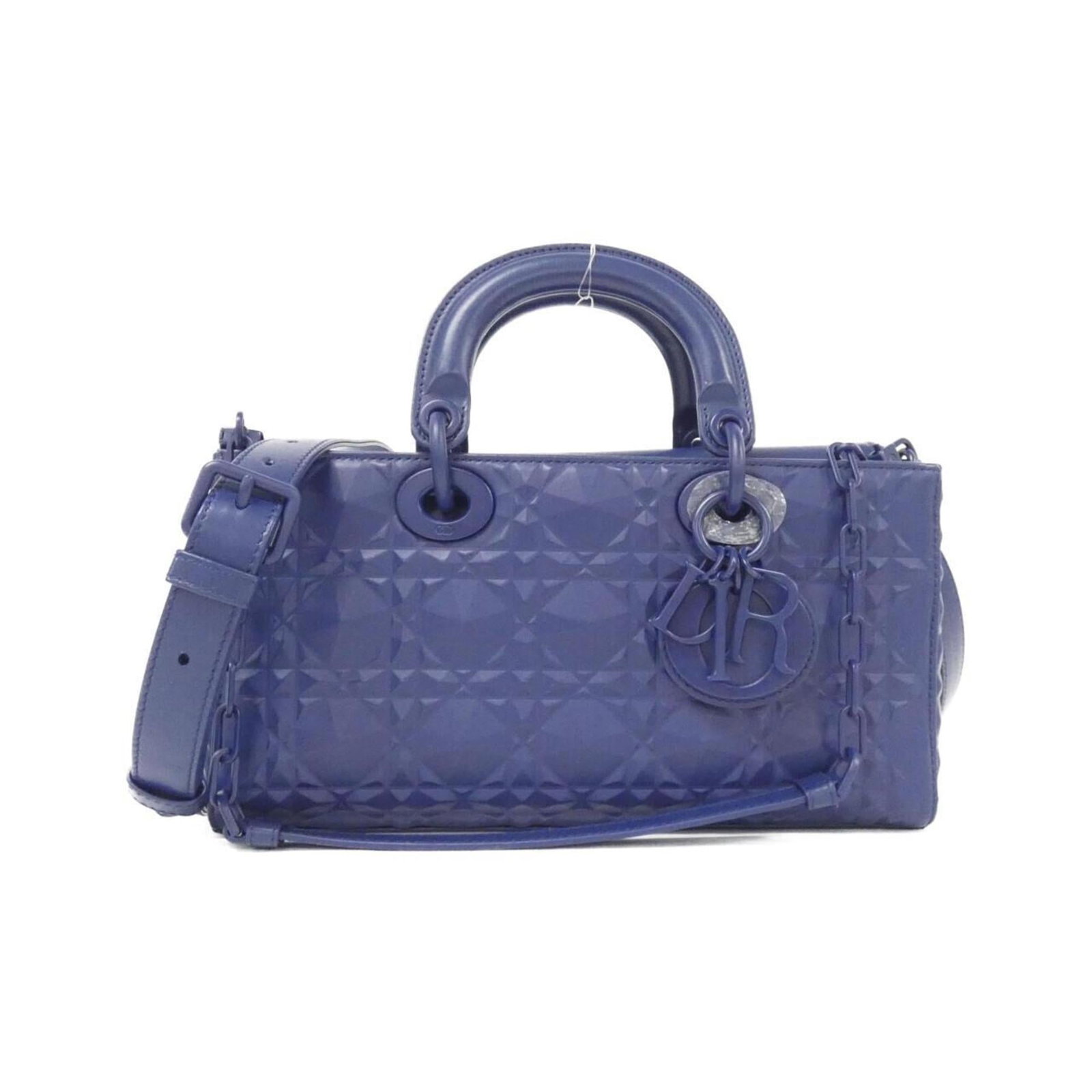 Christian Dior Handbag Leather: Christian Dior Handbag Leather The Christian Dior handbag features high-quality calfskin leather in a beautiful blue hue. With its classic design and timeless style, this piece is a great addition to 