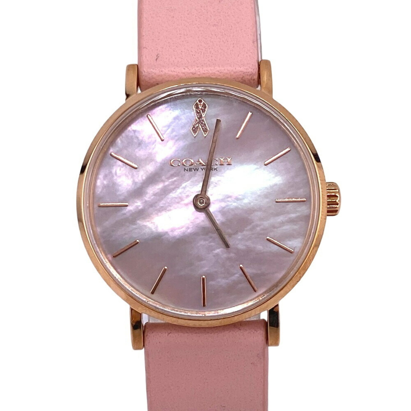 Coach Wristwatch: Coach Wristwatch Pink leather band and pink dial make for a stylish combination in this Coach wristwatch. With its 23mm case diameter, it's designed to fit wrists up to 17cm in size. The watch has