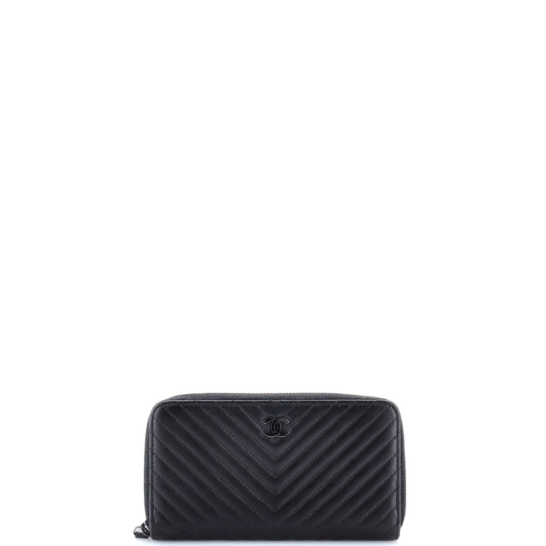 Lambskin small wallet zip around chevron Chanel: Lambskin small wallet zip around chevron Chanel Small, sleek Chevron Lambskin wallet with a zip around closure in black leather. Minor scuffs and creasing on the exterior, wear on edges, and some