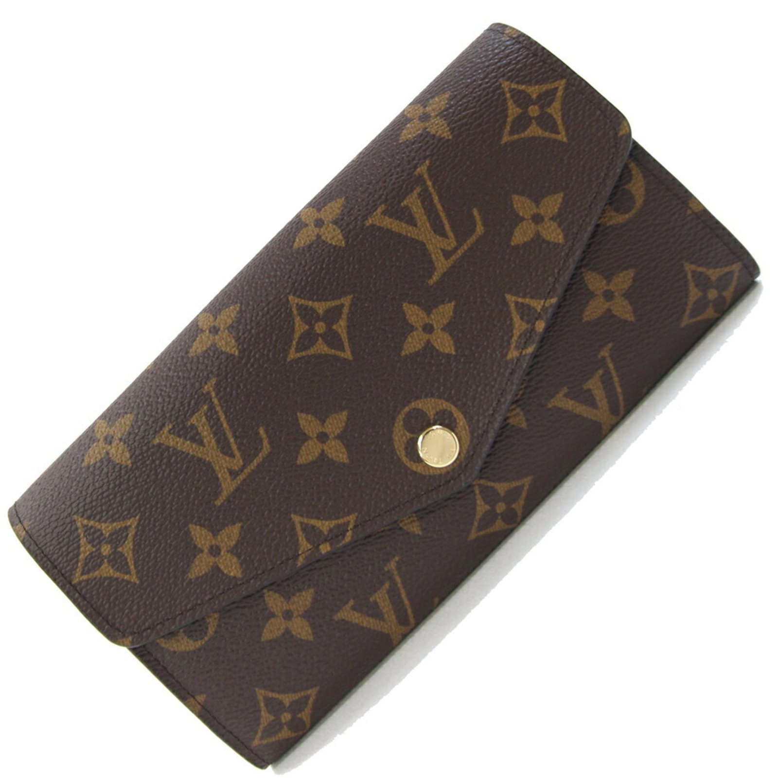 Louis Vuitton Monogram Bi fold Wallet: Louis Vuitton Monogram Bi fold Wallet Monogrammed luxury at its finest, this Louis Vuitton bi-fold wallet boasts the iconic Monogram pattern in rich colors. With a sleek design and durable constructio