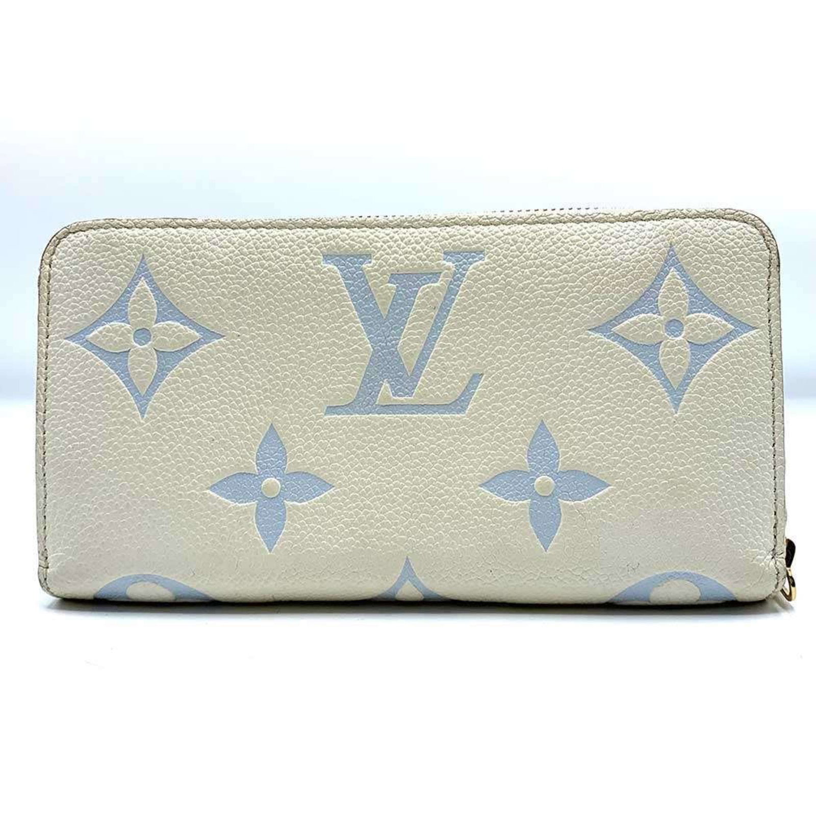 Louis Vuitton Bi Fold Monogram Empreinte Wallet: Louis Vuitton Bi Fold Monogram Empreinte Wallet Monogram Empreinte pattern adds a touch of elegance to this Louis Vuitton bi-fold wallet, featuring the iconic design that has been a hallmark of luxury