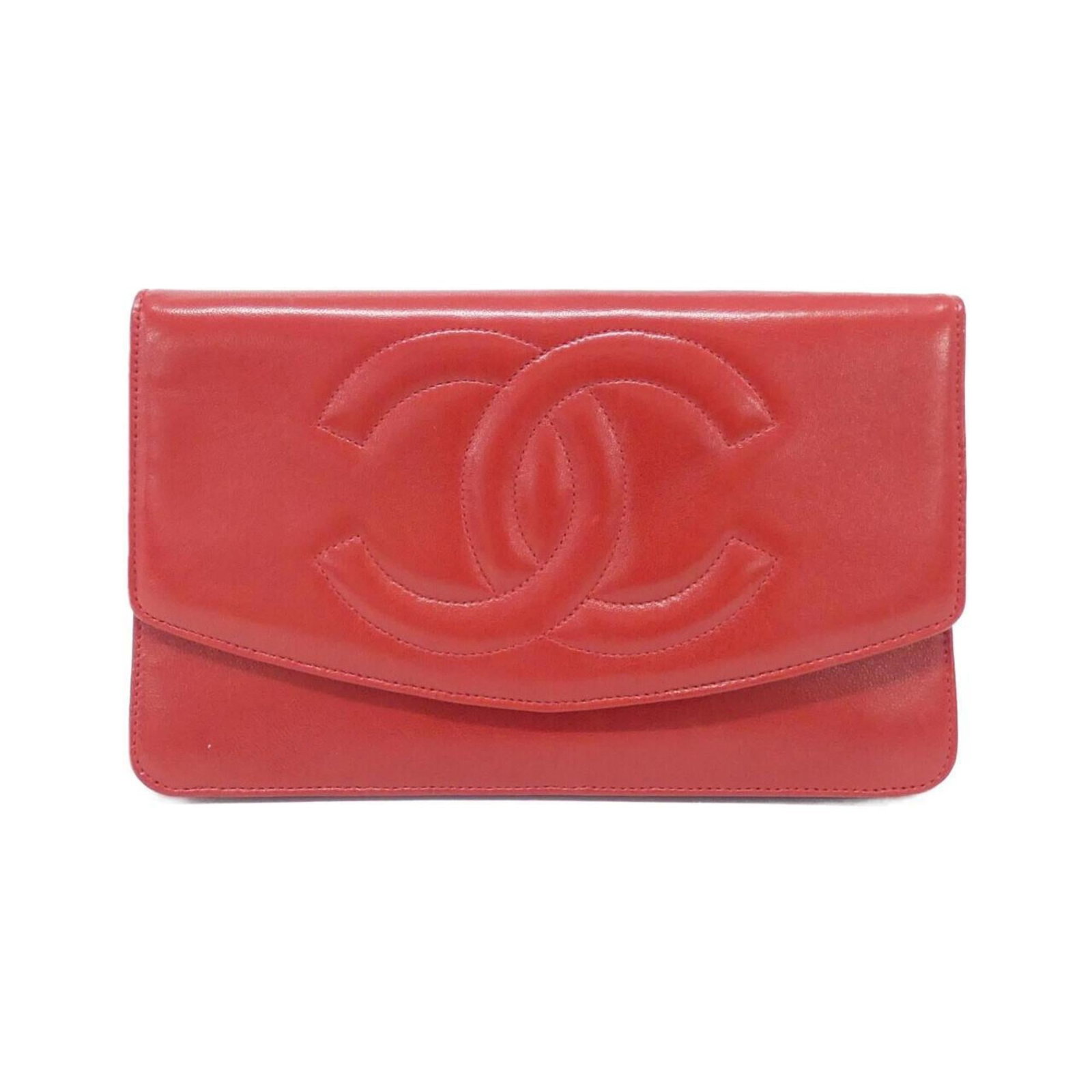 Chanel Long Wallet (Bi-Fold) Leather: Chanel Long Wallet (Bi-Fold) Leather Chanel's iconic long wallet in vibrant red, crafted from high-quality lamb leather. With its classic bi-fold design and timeless elegance, this piece is a staple