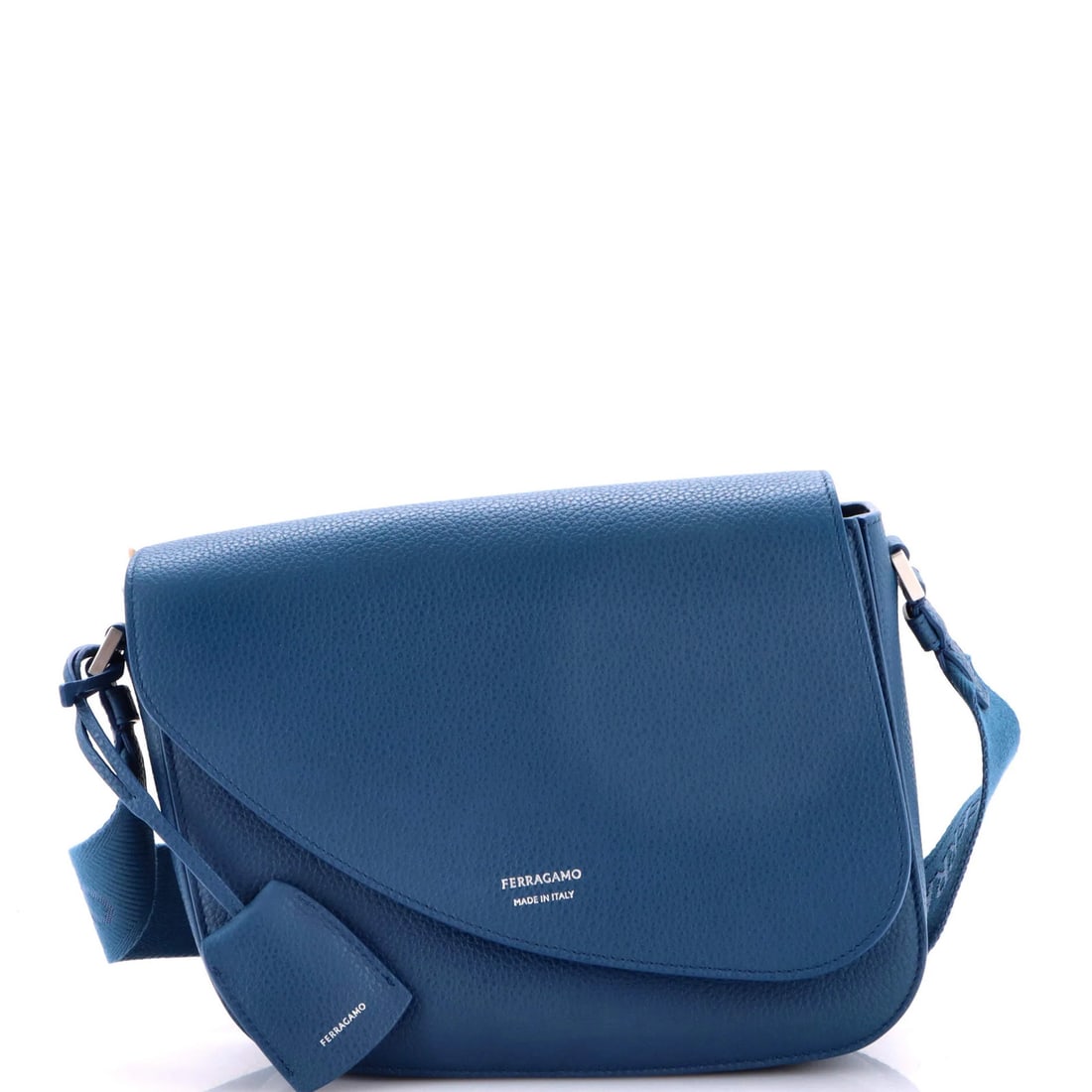 Ferragamo Fiamma Leather Messenger Small Salvatore Bag: Ferragamo Fiamma Leather Messenger Small Salvatore Bag Small blue leather messenger bag with silver hardware, featuring minor creases on exterior and interior. The Fiamma Messenger Bag measures 6" tal