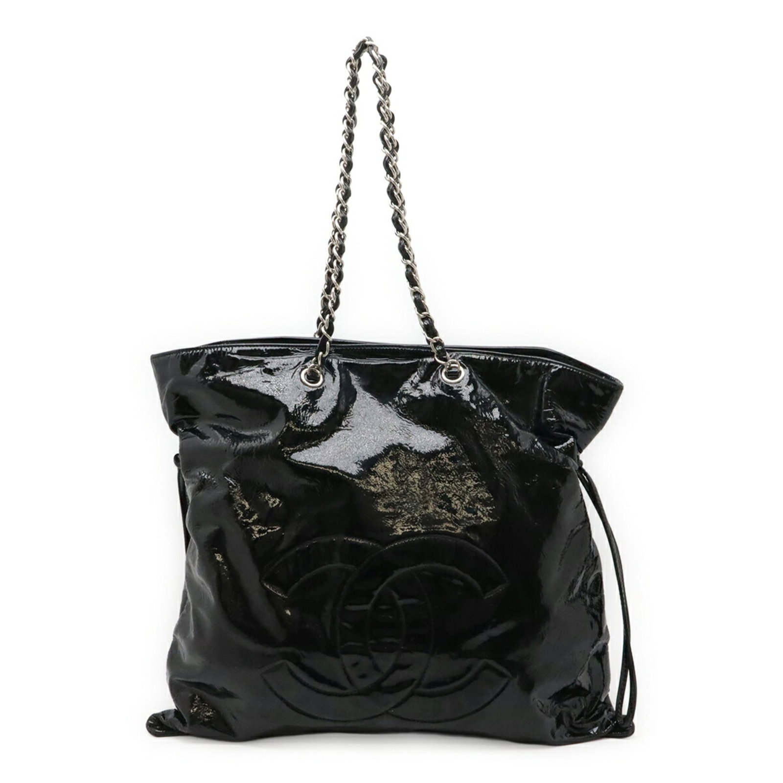 Shoulder bag tote in leather by Chanel: Shoulder bag tote in leather by Chanel This classic Chanel leather shoulder bag tote boasts sleek, timeless design in black enamel leather. Measuring 41.5cm x 45cm, it features a durable construction 