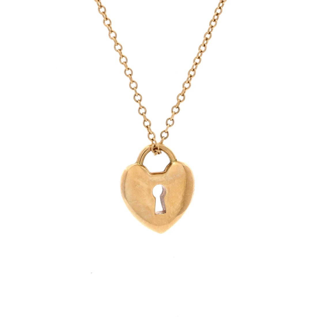 Heart Lock Pendant Necklace in 18K Rose Gold by Tiffany Co: Heart Lock Pendant Necklace in 18K Rose Gold by Tiffany Co The Tiffany & Co. Heart Lock Pendant Necklace in 18K Rose Gold is a stunning piece featuring a heart-shaped lock design, showcasing the