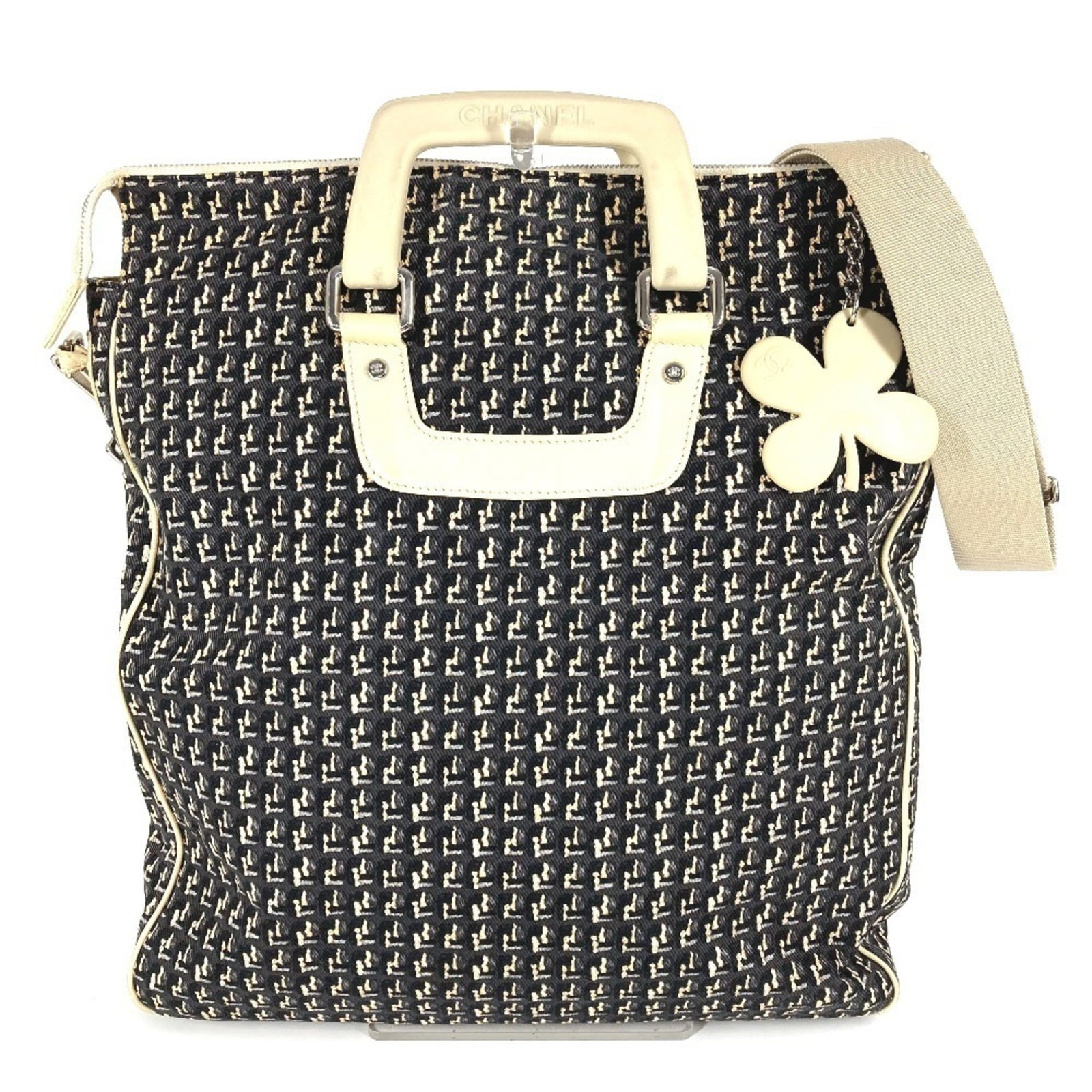 Canvas leather shoulder bag handbag: Canvas leather shoulder bag handbag Canvas leather shoulder bag in beige and black, featuring a classic design with a canvas upper and leather trim. The bag measures 38cm x 34.5cm x 8cm and shows sign