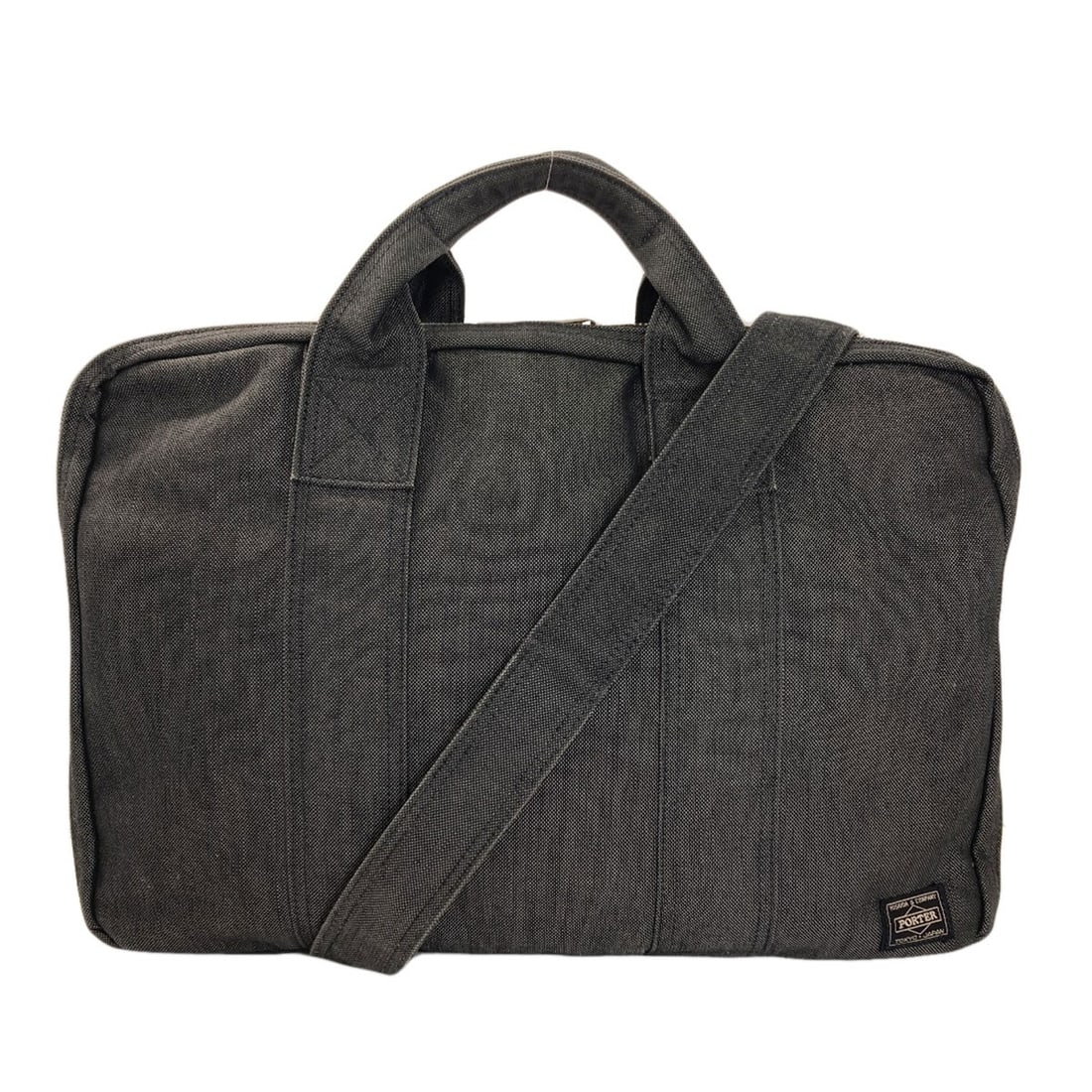 Porter 2Way Business Bag Canvas: Porter 2Way Business Bag Canvas Canvas bag with black exterior, featuring a classic design. Made from high-quality canvas material, this 2-way business bag offers a timeless and versatile style for