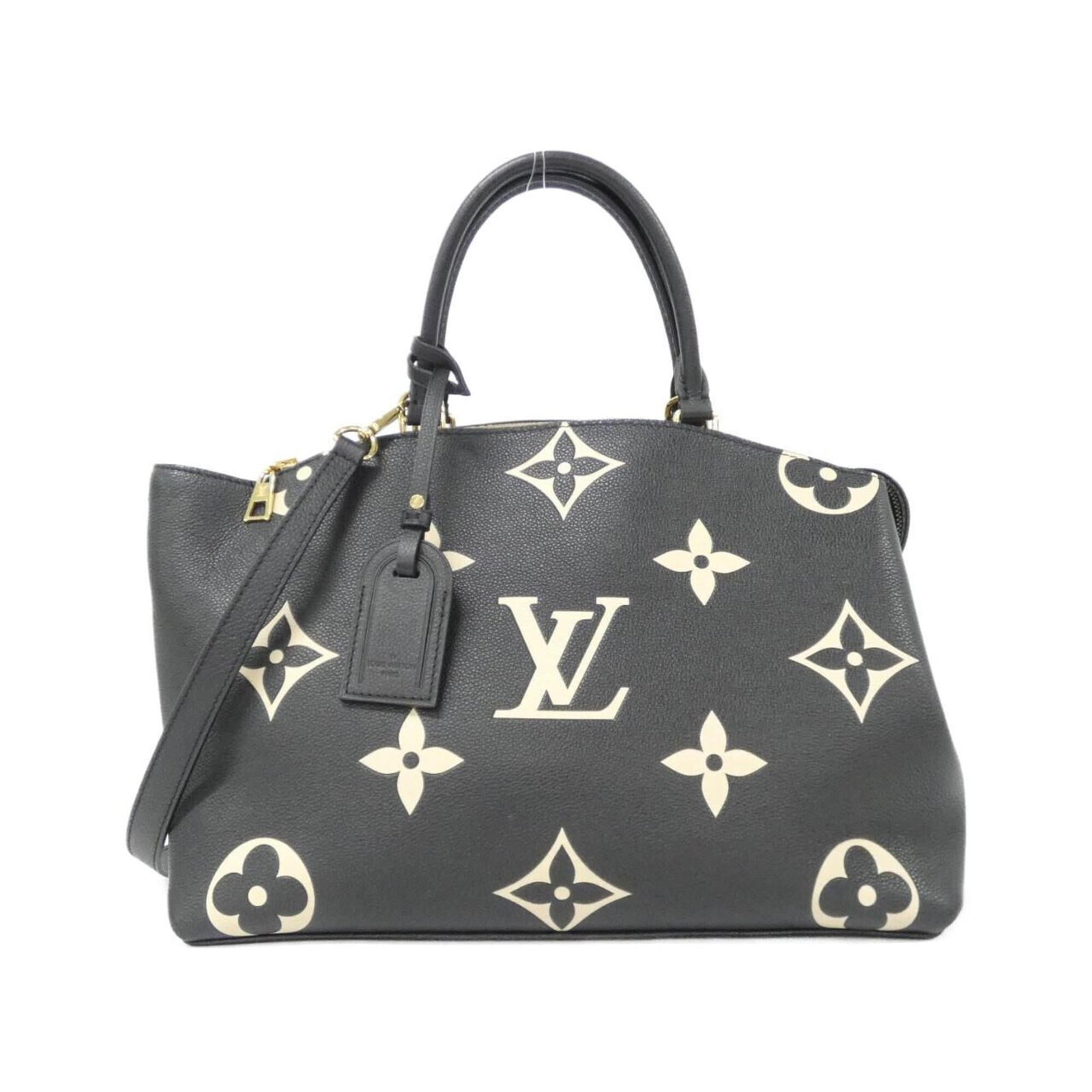 Handbag Leather Louis Vuitton: Handbag Leather Louis Vuitton This Louis Vuitton handbag features high-quality calfskin leather in beige and black, with a classic design that exudes timeless elegance. Measuring 24cm x 34cm x 15cm, i