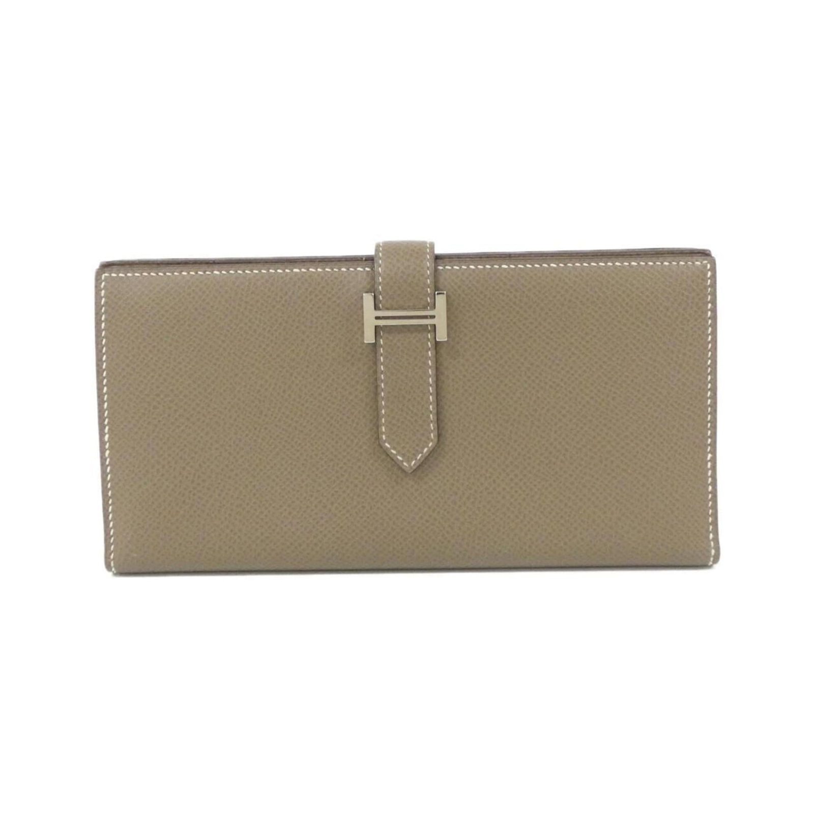 Epsom long bi-fold leather wallet from Hermes: Epsom long bi-fold leather wallet from Hermes Epsom long bi-fold leather wallet from Hermes, featuring high-quality Epsom leather in Etoupe Gray and Soufre colors. This stylish wallet measures 9cm x 1