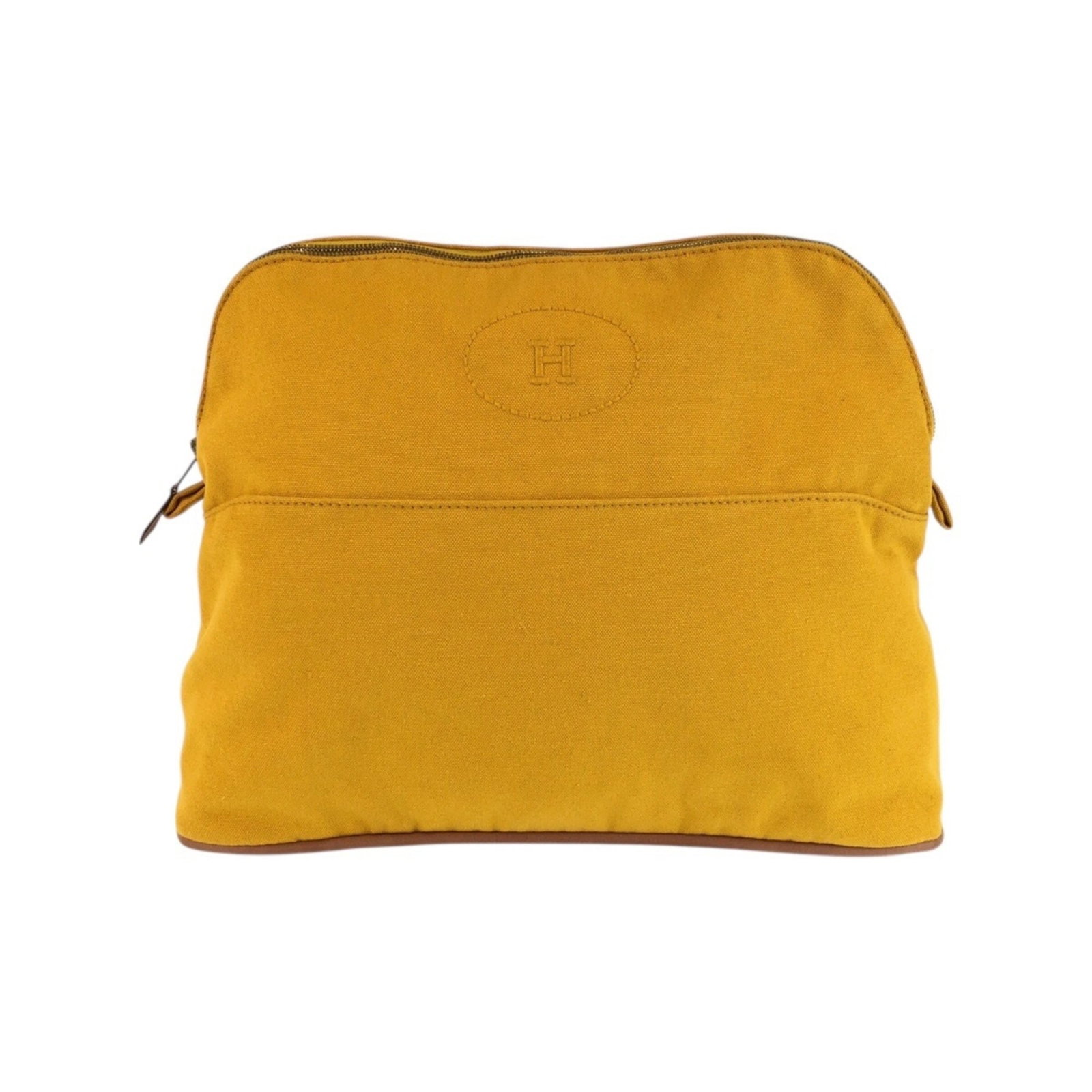 Hermes Pouch Handbag Canvas: Hermes Pouch Handbag Canvas Mustard and Yellow Canvas Pouch from Hermes. This pre-owned canvas handbag features a unique mustard and yellow color combination, characteristic of the iconic brand's