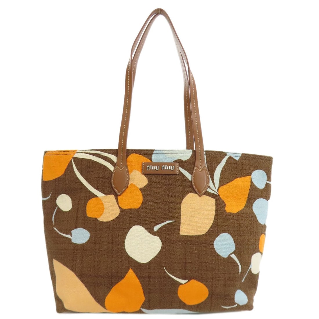 Logo tote bag canvas: Logo tote bag canvas Brown canvas tote bag with MIUMIU logo. Made from high-quality canvas, this tote features the brand's signature style and design. A simple yet stylish accessory for everyday use.