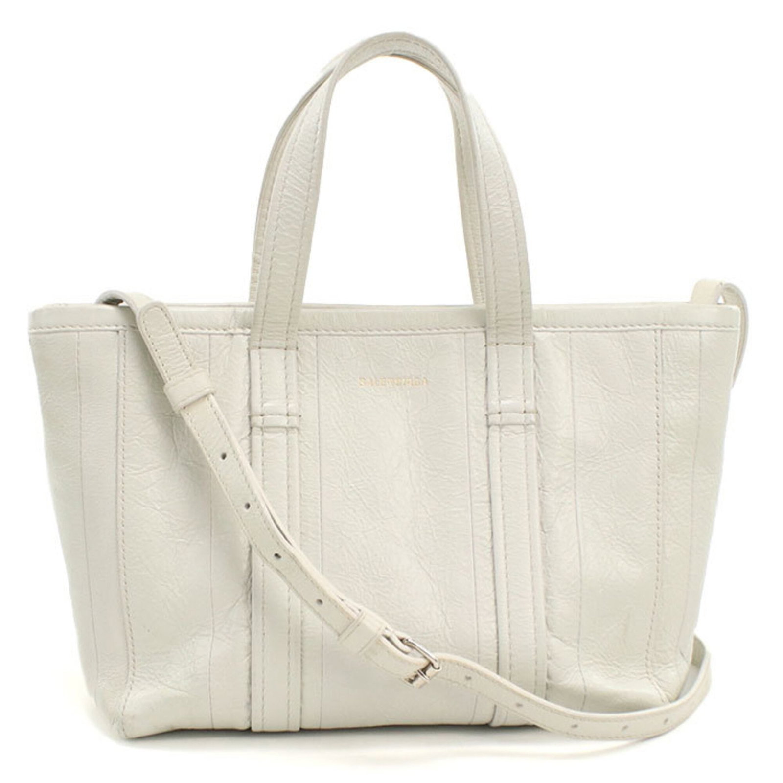 Bag Leather Tote Balenciaga: Bag Leather Tote Balenciaga White leather tote bag from Balenciaga, featuring silver hardware and a classic design. The bag has some traces of usage, with scratches and dirt visible, but remains in