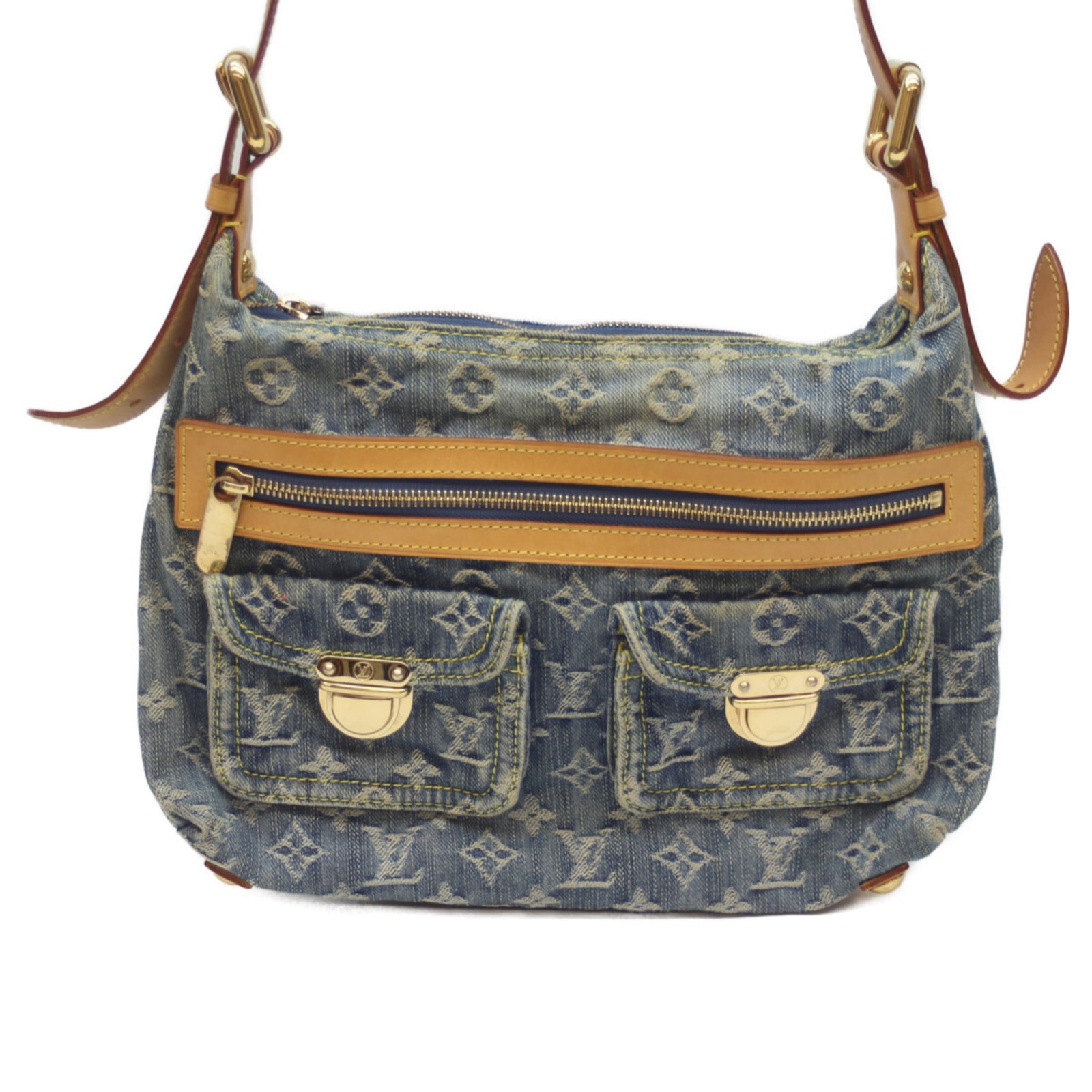 Monogram Denim Bag from Louis Vuitton: Monogram Denim Bag from Louis Vuitton This Louis Vuitton Monogram Denim bag features the iconic monogram pattern in blue, adding a touch of classic style to any outfit. With its durable denim material