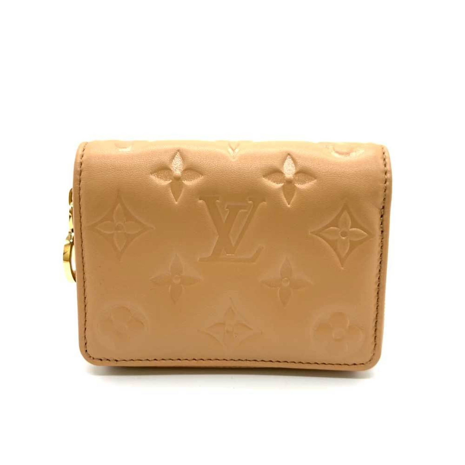 Louis Vuitton Wallet (Bi-Fold): Louis Vuitton Wallet (Bi-Fold) Camel-colored bi-fold wallet from Louis Vuitton, featuring a classic design with a few traces of usage visible. The wallet has some scratches and dirt, but overall remai