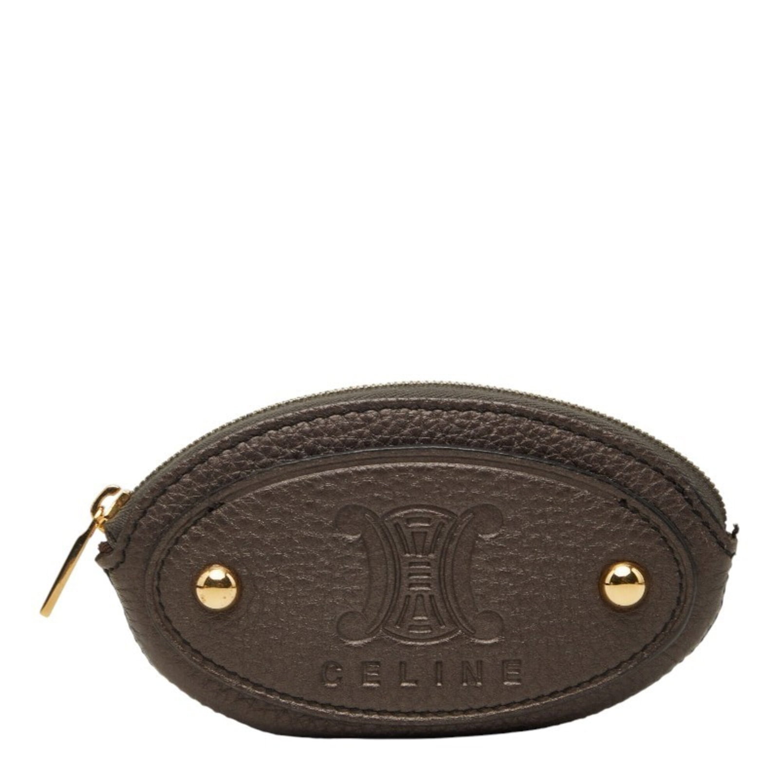 Celine Coin Purse/ Coin Case Leather: Celine Coin Purse/ Coin Case Leather This Celine coin purse features high-quality brown leather construction, with a classic design that exudes timeless elegance. Measuring 7cm x 13cm x 2cm, it