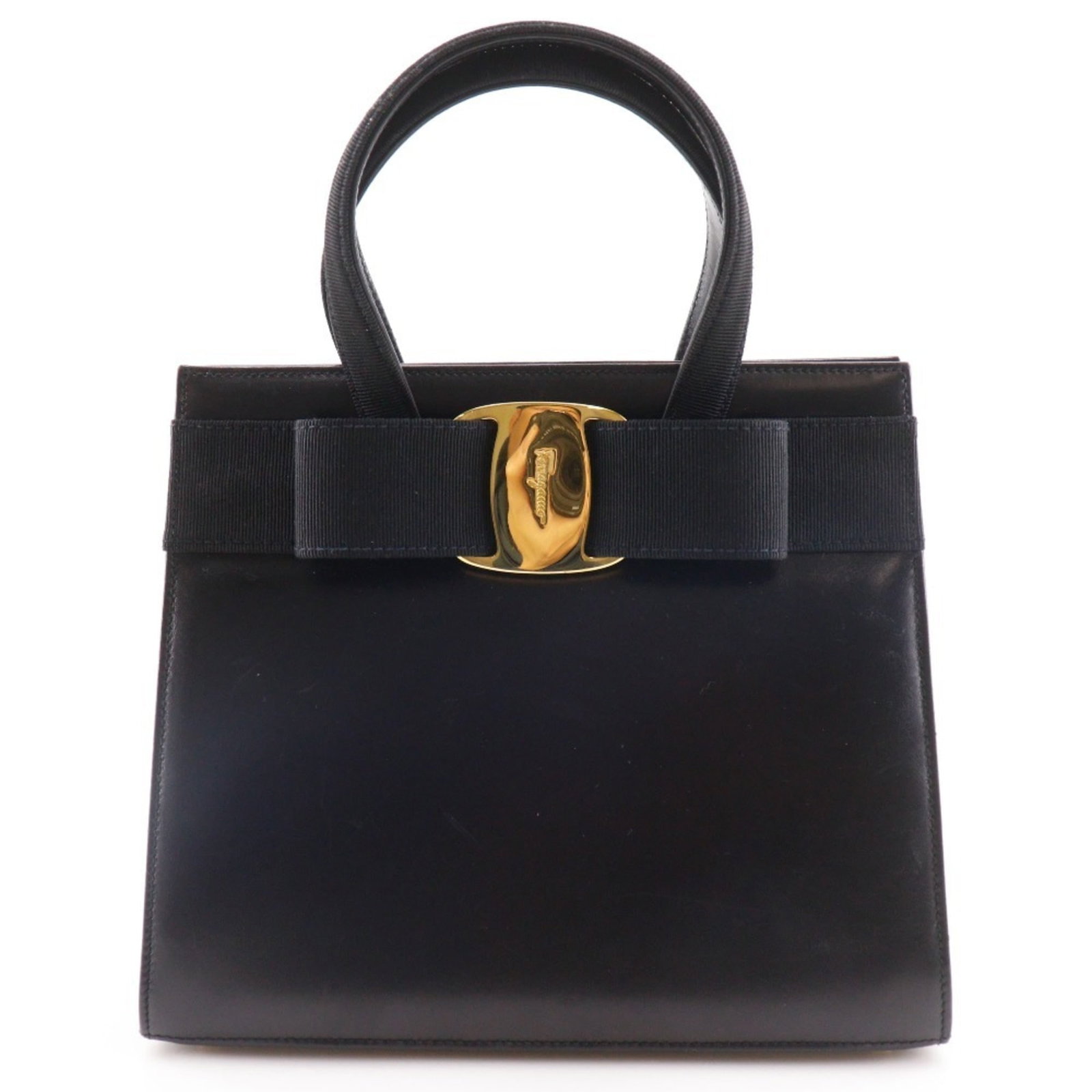 Ferragamo Salvatore Handbag Leather: Ferragamo Salvatore Handbag Leather Black Calfskin Salvatore Ferragamo Handbag with Traces of Usage. This used handbag features leather calfskin material and measures 21cm x 24cm x 10cm. With visible