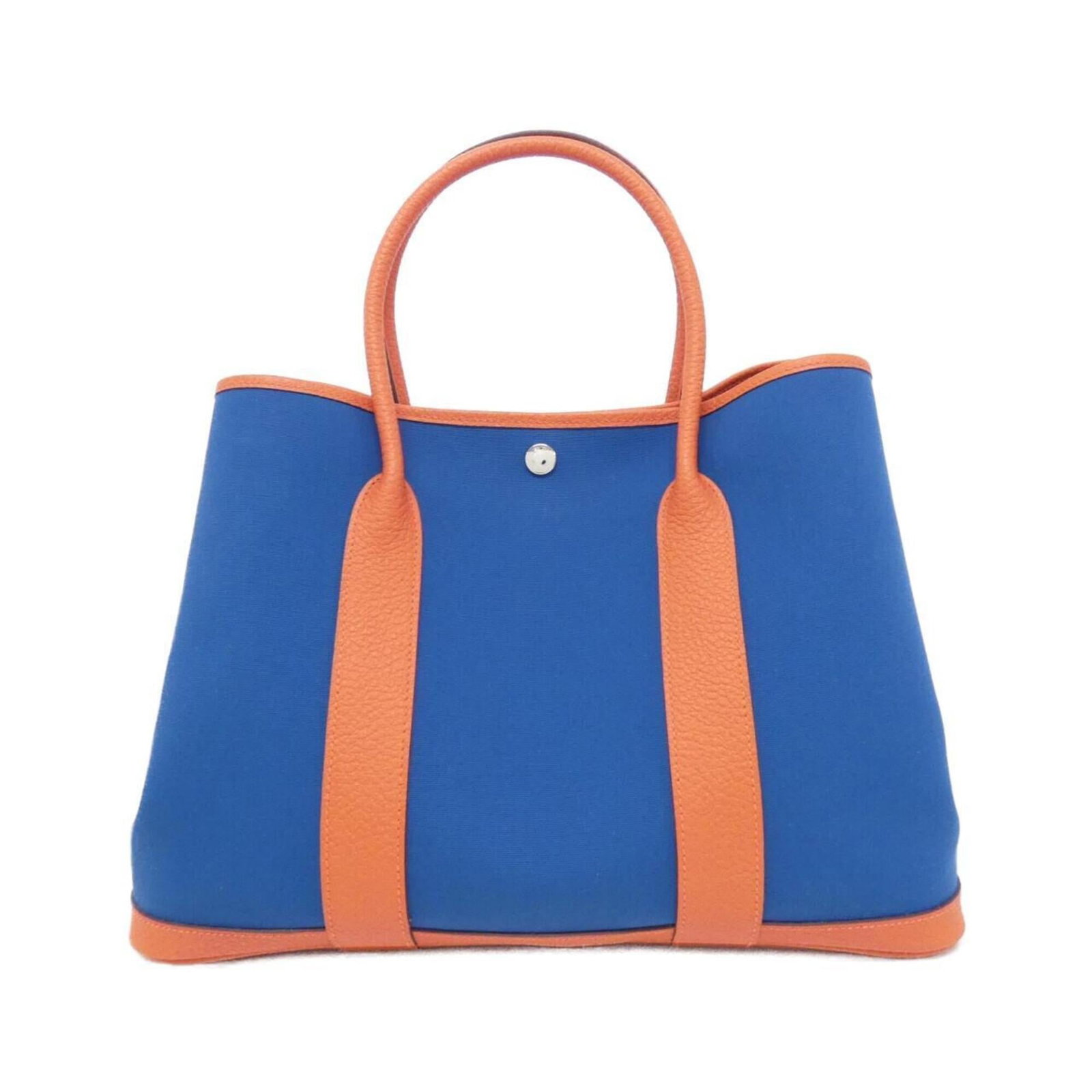 Hermes Handbag Toile Officier Country Leather: Hermes Handbag Toile Officier Country Leather Toile Officier Country Leather Handbag by Hermes in Blue. This pre-owned handbag boasts the iconic Toile Officier design, featuring a rich blue Capucine l
