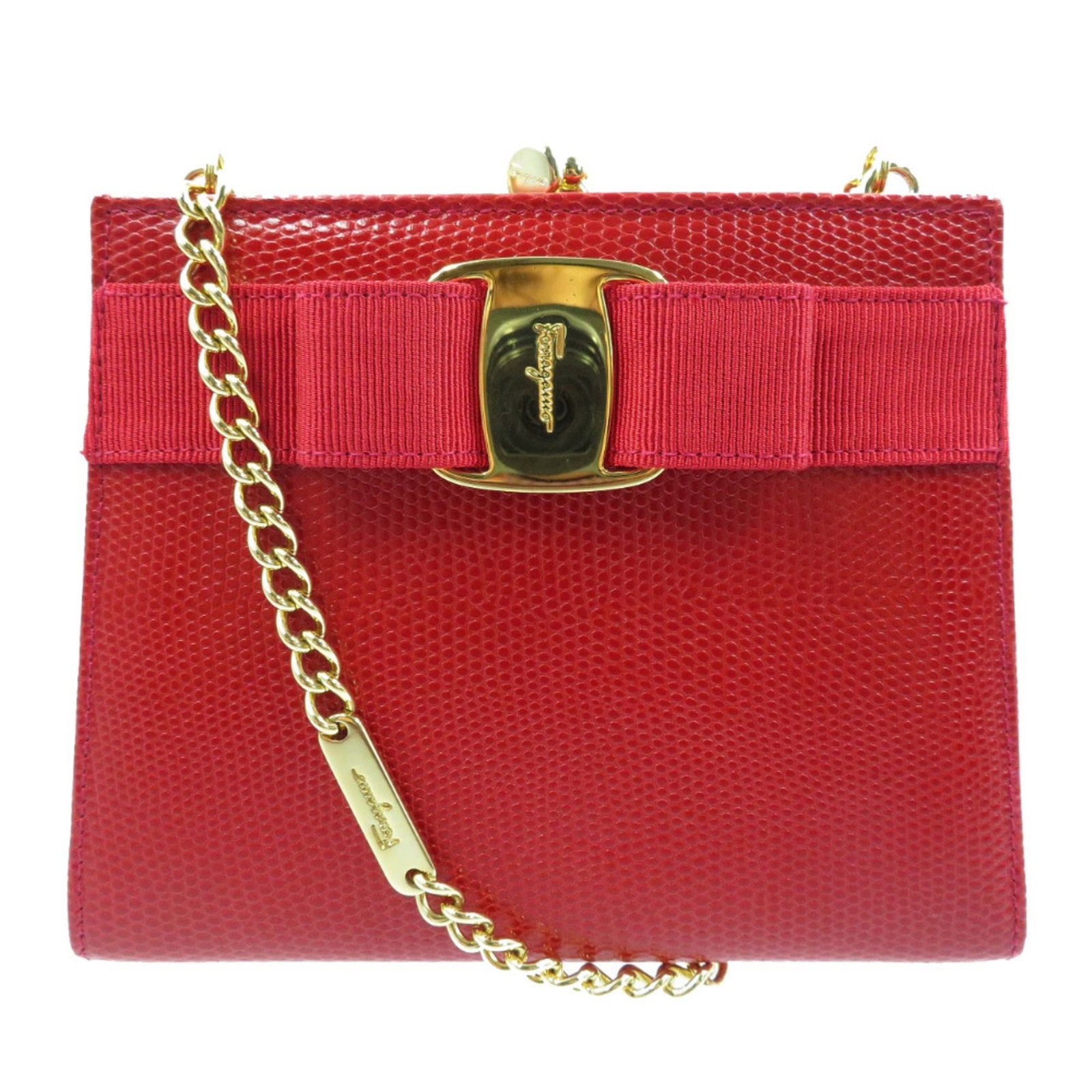 Shoulder bag leather Salvatore Ferragamo: Shoulder bag leather Salvatore Ferragamo This Salvatore Ferragamo shoulder bag features embossed leather with a striking red color. Made from high-quality leather, the bag has a classic design and