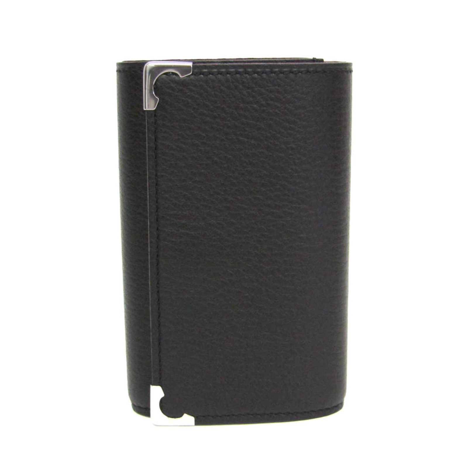 Keycase Cartier Leather: Keycase Cartier Leather Cartier Leather Keycase with Snap Fastener and Open Pocket. This black leather keycase features six key hooks, an open inner pocket, and a durable snap fastener closure. With