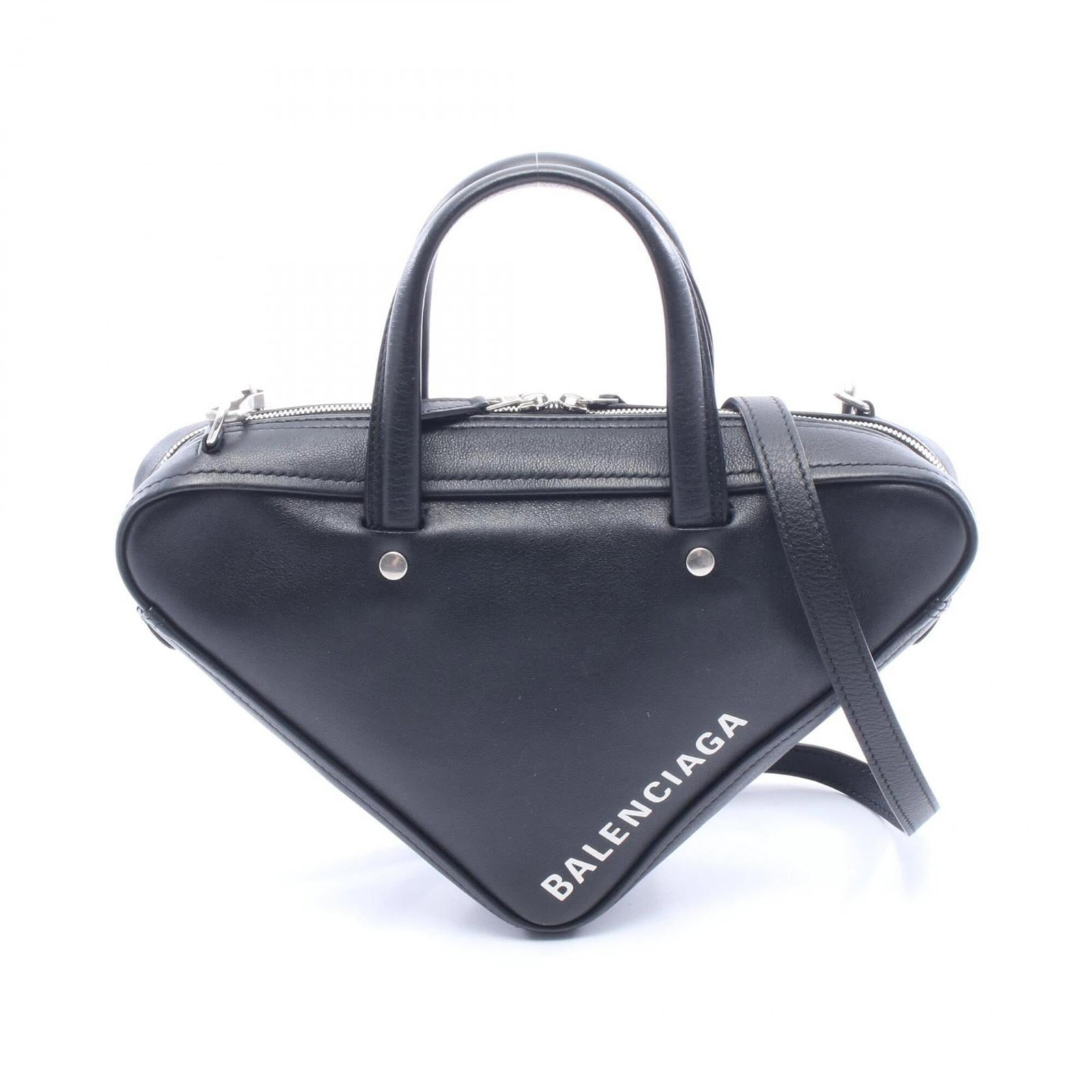 Balenciaga Handbag Leather: Balenciaga Handbag Leather Black Balenciaga leather handbag with a classic design, measuring 17cm x 31.5cm x 9cm, featuring a few traces of usage and minor scratches/dirt. The bag is in very good