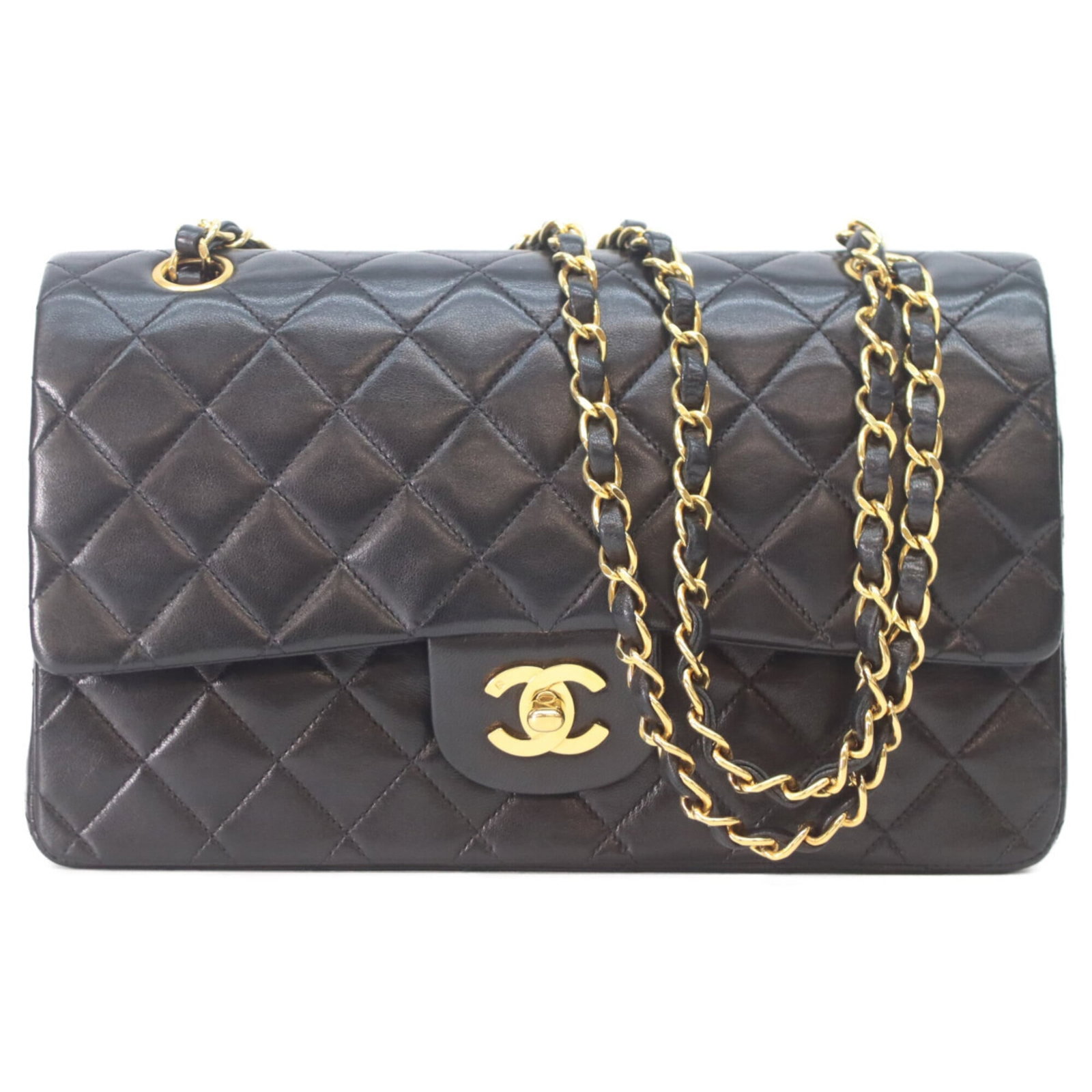 Shoulder bag leather Chanel: Shoulder bag leather Chanel Black lambskin leather Chanel shoulder bag with gold hardware, featuring a classic design and timeless elegance. The bag has some minor scratches and dirt from use, but rem