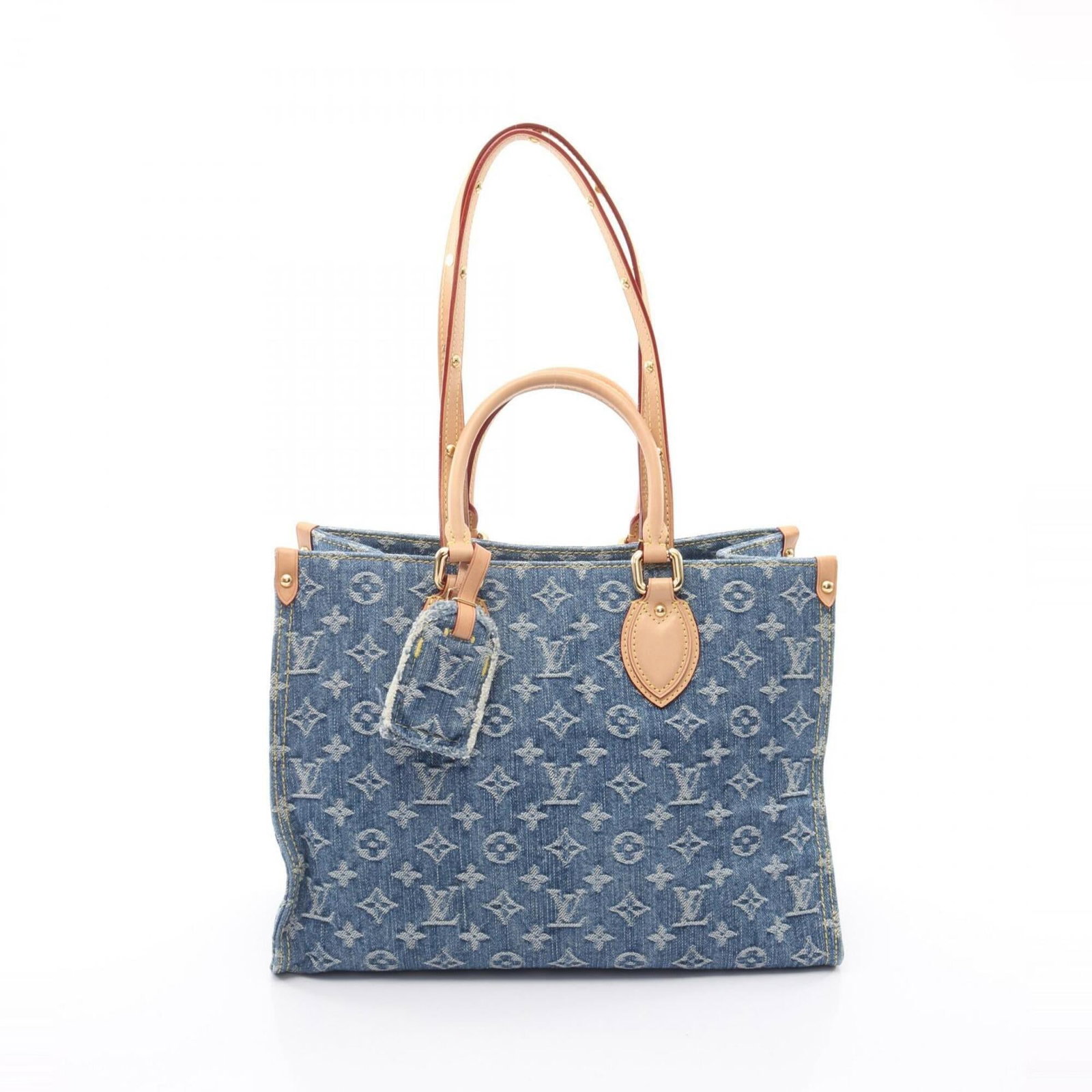 Handbag Tote Bag Leather Denim Louis Vuitton: Handbag Tote Bag Leather Denim Louis Vuitton Denim and leather come together in a unique Louis Vuitton design, featuring a blue color and classic tote bag shape. The item has some signs of usage,
