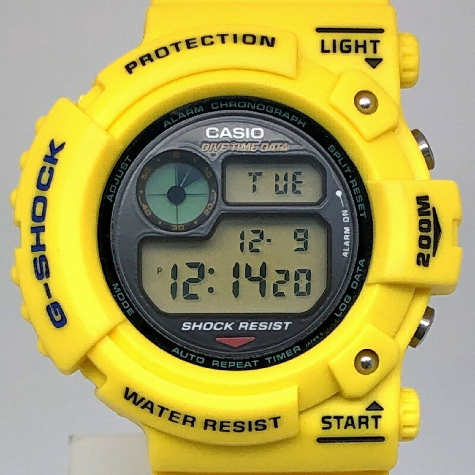 Wristwatch by Casio: Wristwatch by Casio Yellow resin Casio wristwatch with leather band, bearing traces of usage and minor scratches. Digital display shows the time in a straightforward manner. Overall, the watch appears
