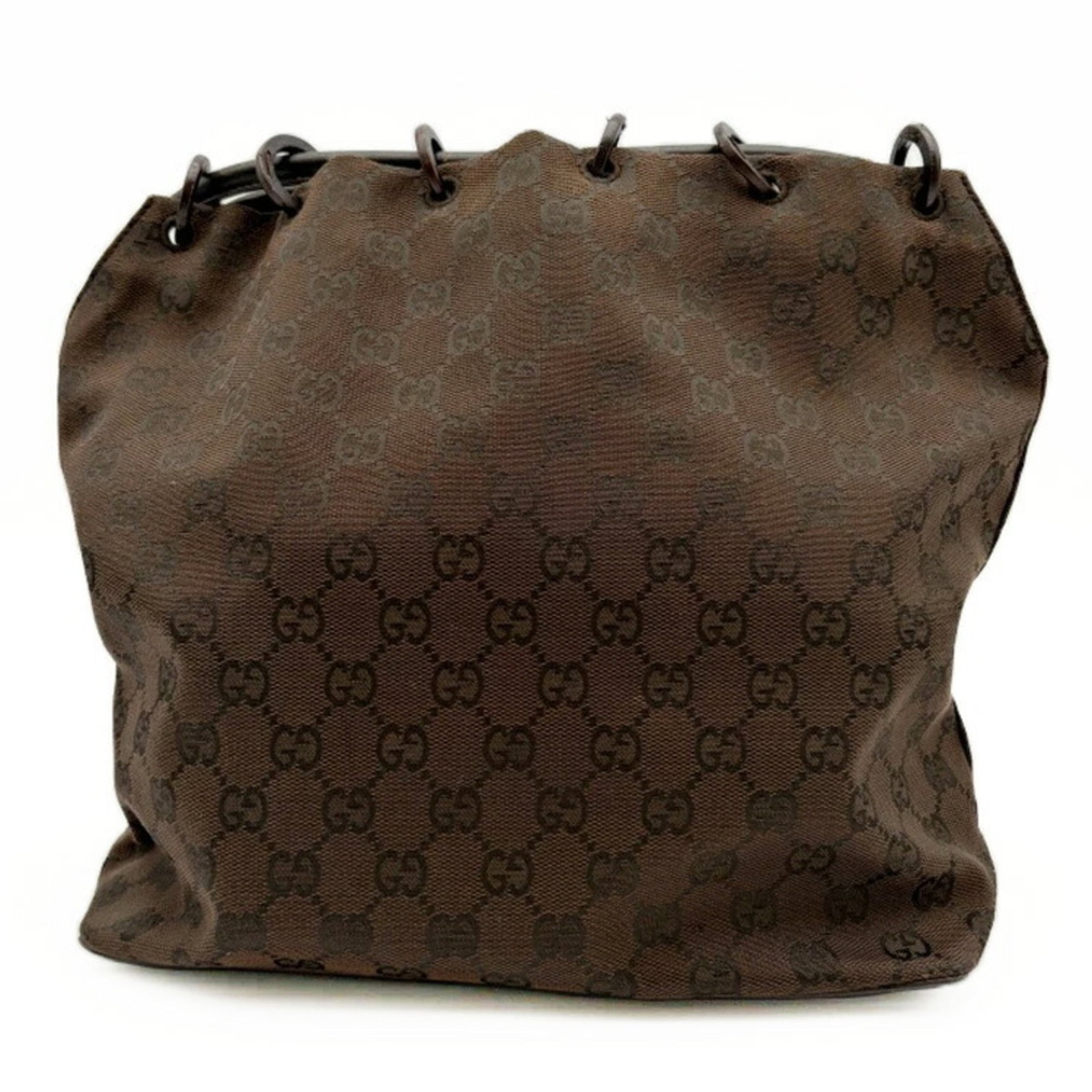 Canvas leather shoulder bag by Gucci: Canvas leather shoulder bag by Gucci Gucci's canvas leather shoulder bag boasts a timeless design with its brown color and classic shape. The bag features a sturdy handle that measures 72cm in