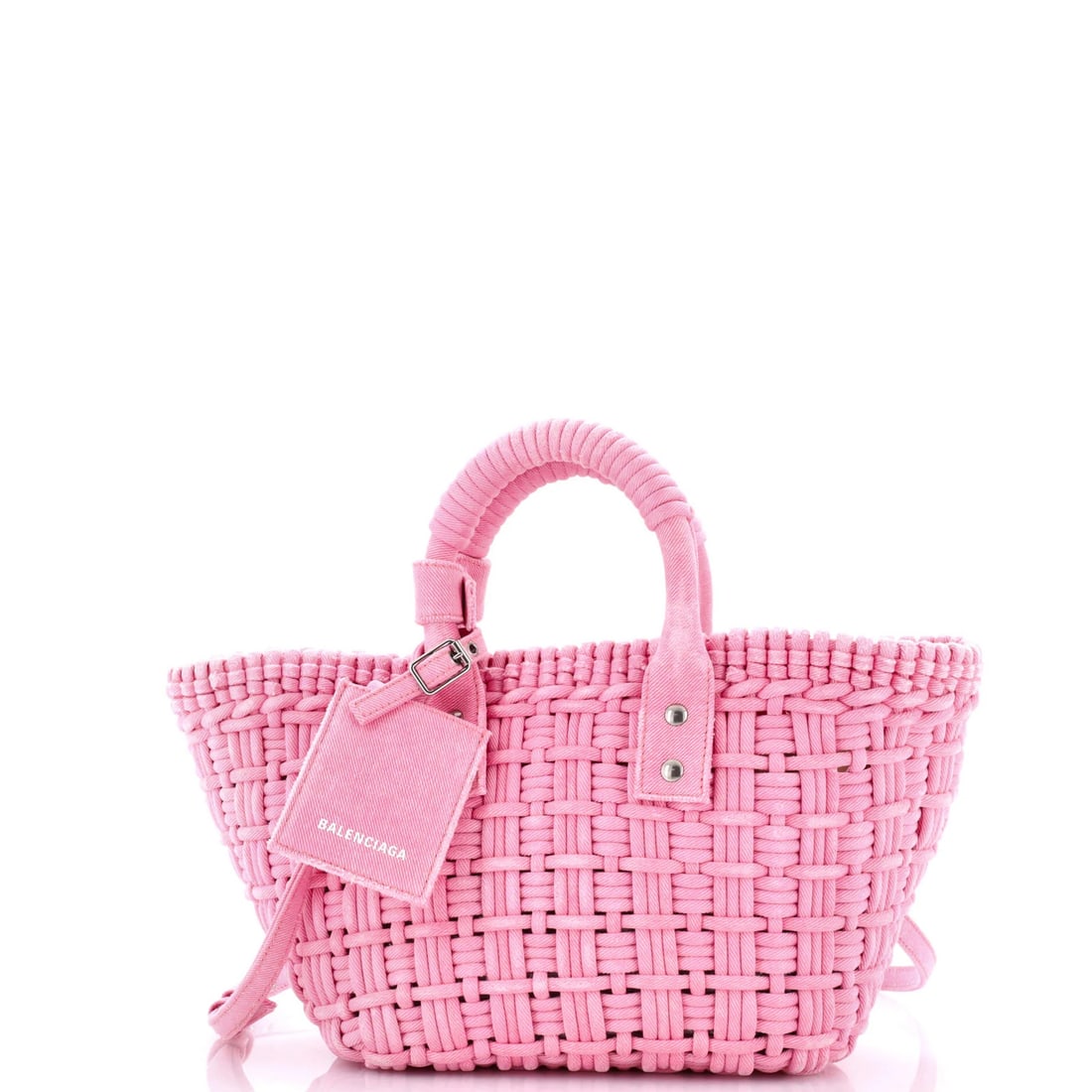 XS Denim Woven Panier Bag Bistro: XS Denim Woven Panier Bag Bistro This Balenciaga Bistro Panier Bag features a unique woven denim exterior in pink, adding a touch of elegance to any outfit. The bag's interior boasts a combination of 