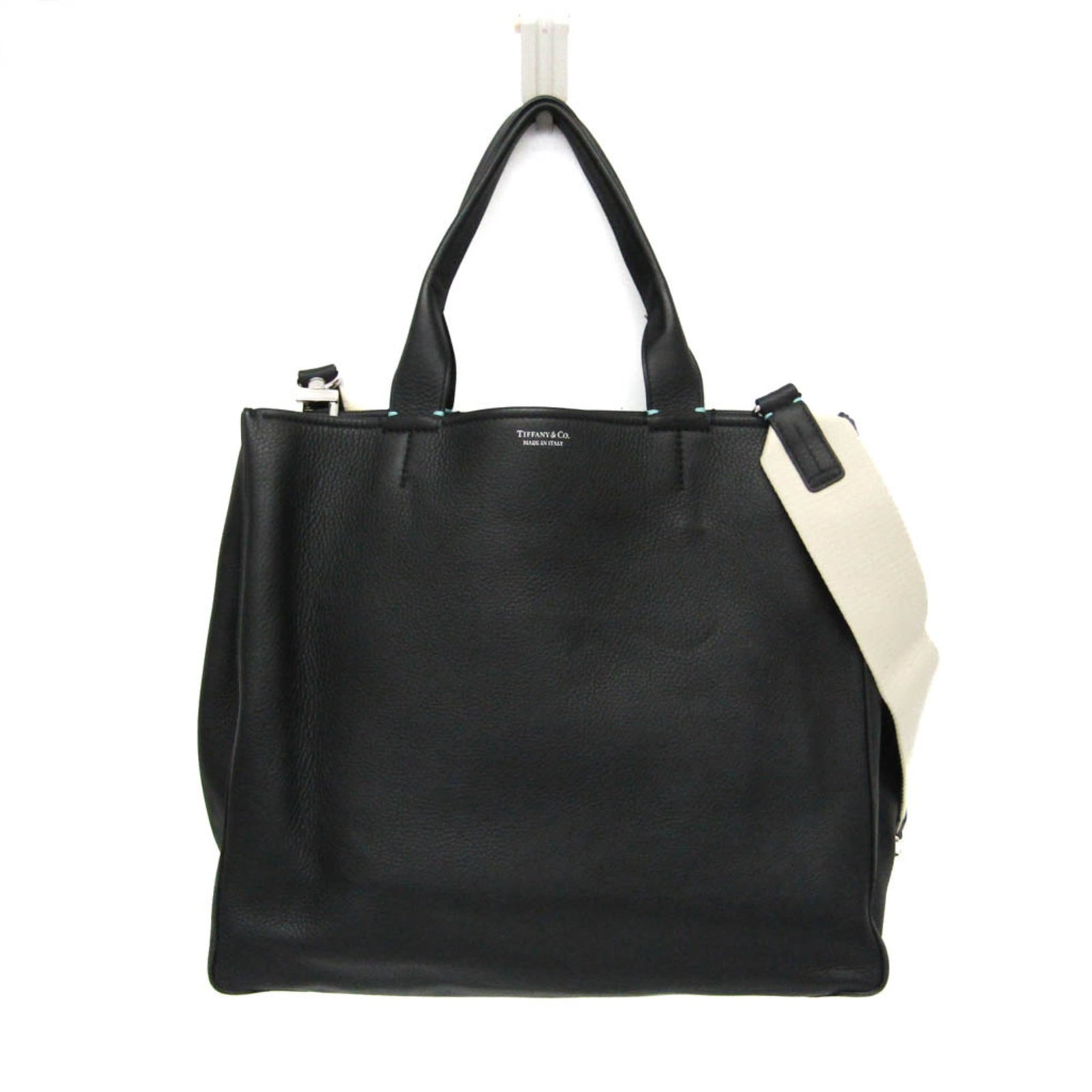 Tiffany Shoulder Bag Tote Bag Leather: Tiffany Shoulder Bag Tote Bag Leather The Tiffany Shoulder Bag Tote Bag Leather features an open design with multiple pockets, including a zipper pocket and two open pockets. Made from high-quality