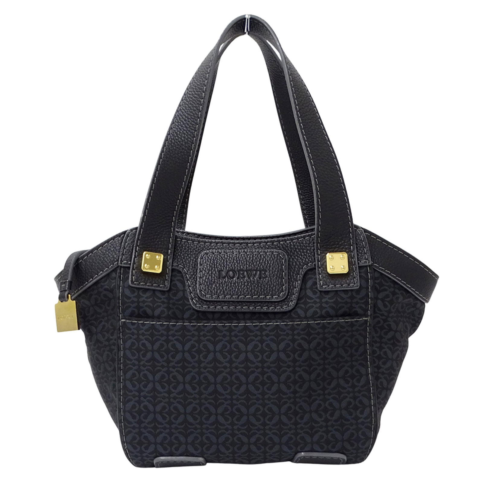 Loewe Handbag Tote Bag Canvas Leather: Loewe Handbag Tote Bag Canvas Leather Canvas and leather blend in this classic Loewe tote bag, featuring a timeless design with clean lines. Measuring 22cm x 22cm x 14cm, it has a sturdy handle that