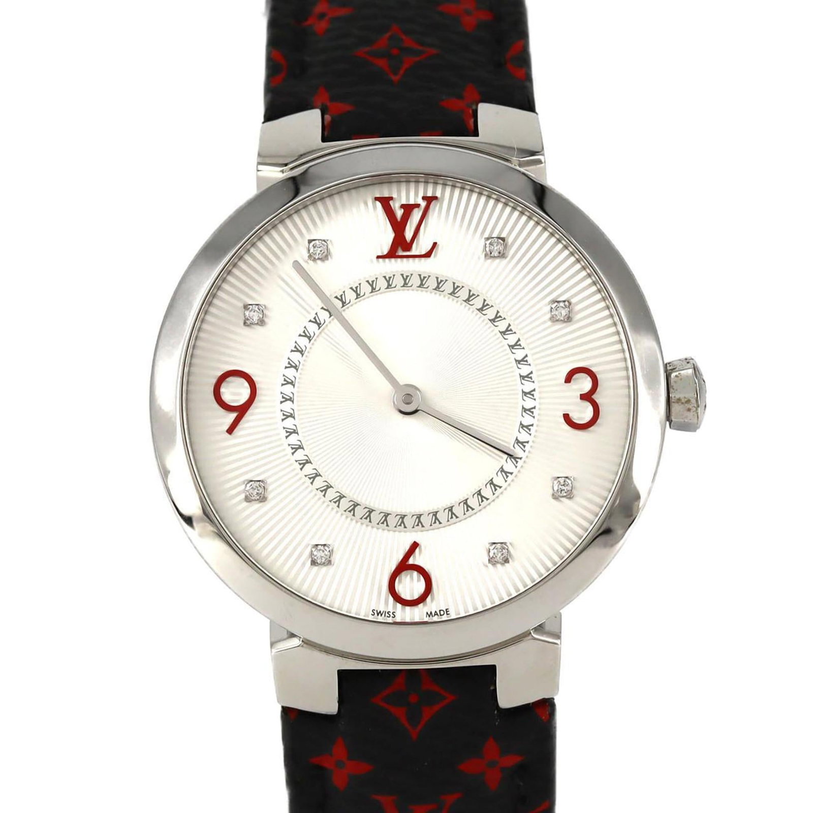 Louis Vuitton Wristwatch: Louis Vuitton Wristwatch Stainless steel case with silver dial, adorned with a diamond gemstone, adds a touch of elegance to this Louis Vuitton wristwatch. The watch features an analog display and