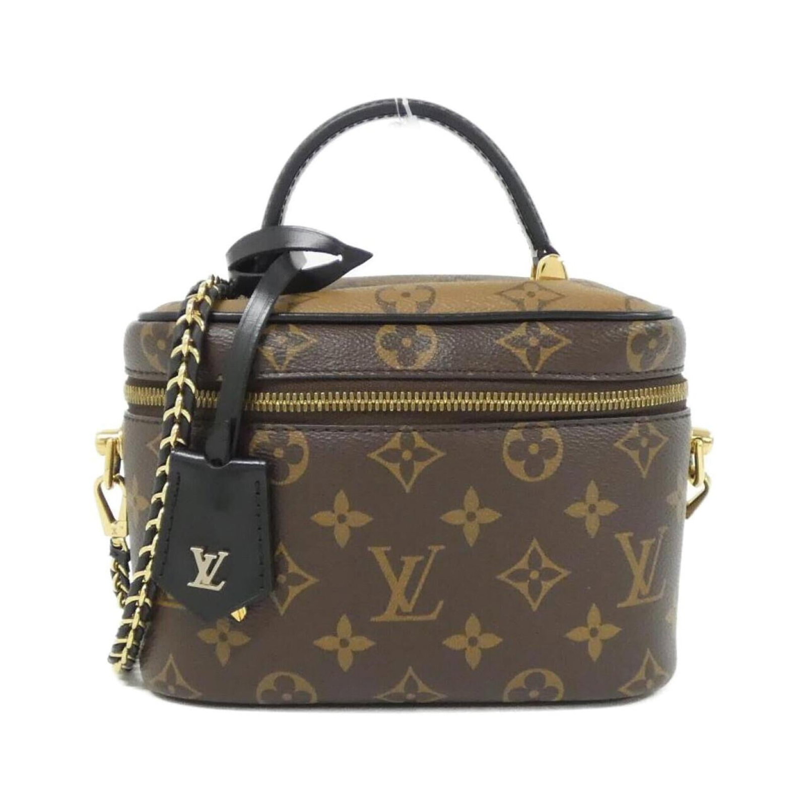 Canvas coated handbag Louis Vuitton: Canvas coated handbag Louis Vuitton Marron coated canvas Louis Vuitton handbag with gold hardware, featuring a classic design and subtle scratches from previous use. The bag's coated canvas material