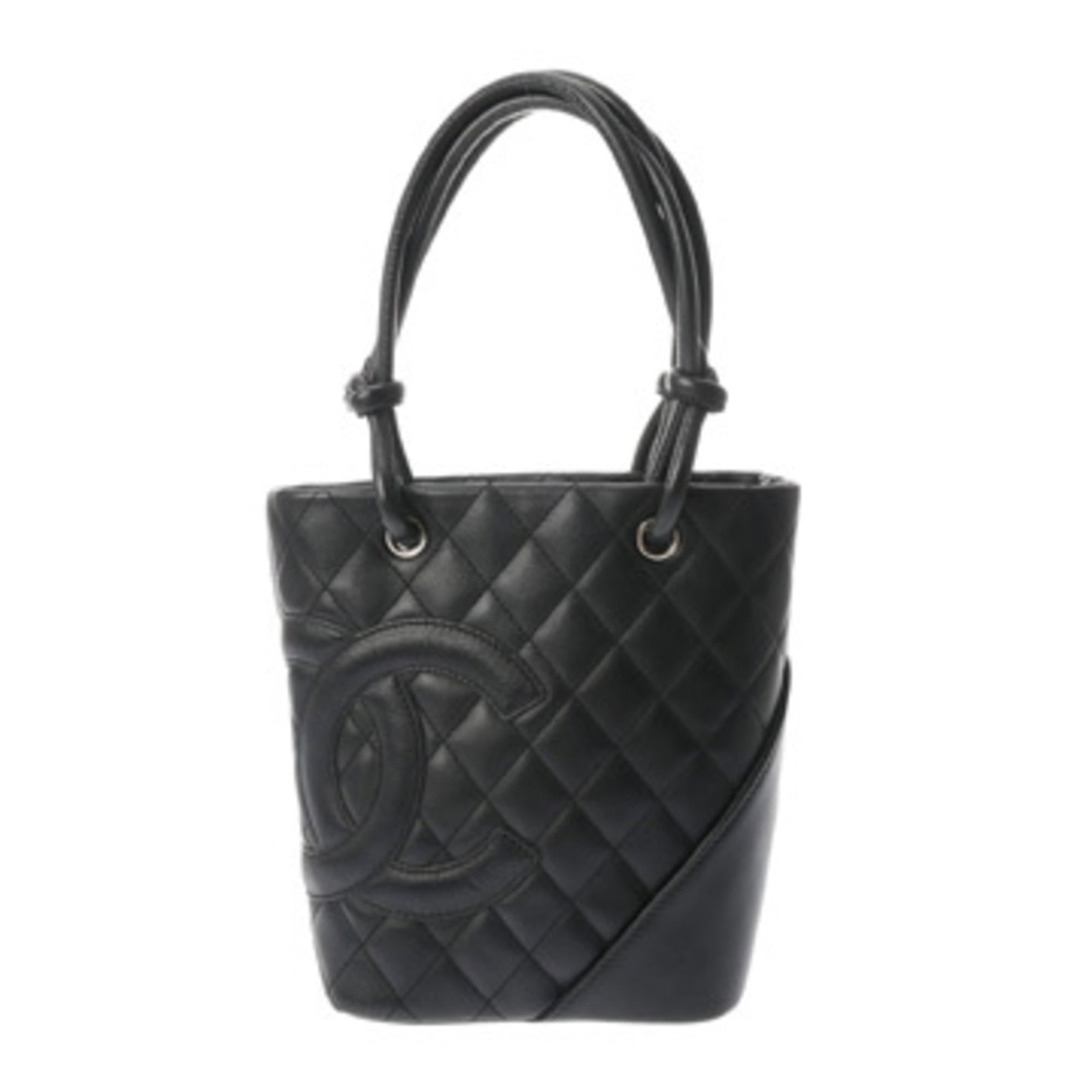 Tote Bag Leather from Chanel: Tote Bag Leather from Chanel Used Chanel Tote Bag in Black Leather. This Calfskin tote features a classic design with a timeless black color, measuring 24cm x 20cm x 12cm. The bag shows signs of usage