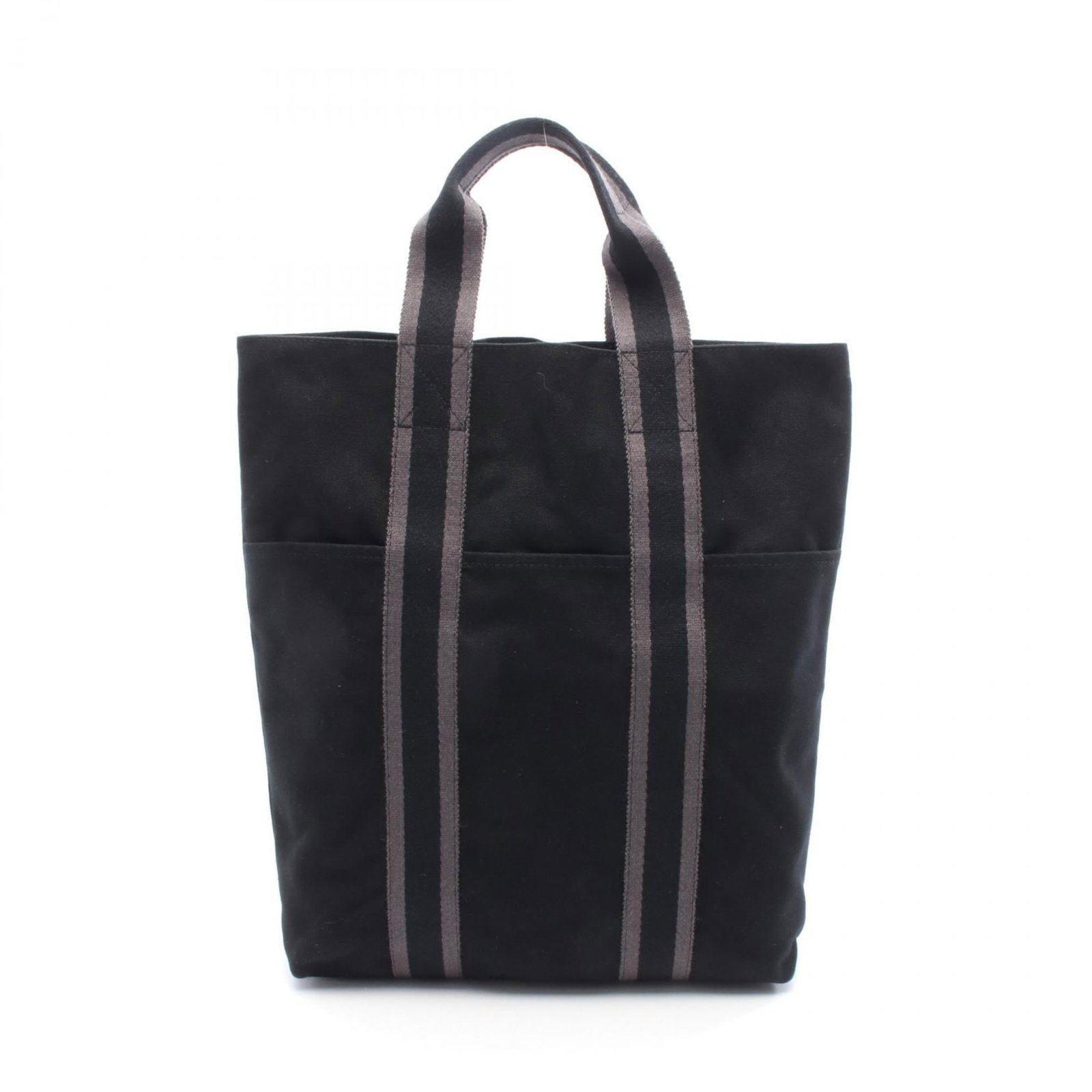 Canvas tote bag by Hermes: Canvas tote bag by Hermes Canvas tote bag by Hermes, featuring a timeless design with black and gray canvas construction. The bag measures 37cm x 29cm x 6cm and bears a signature, making it a unique