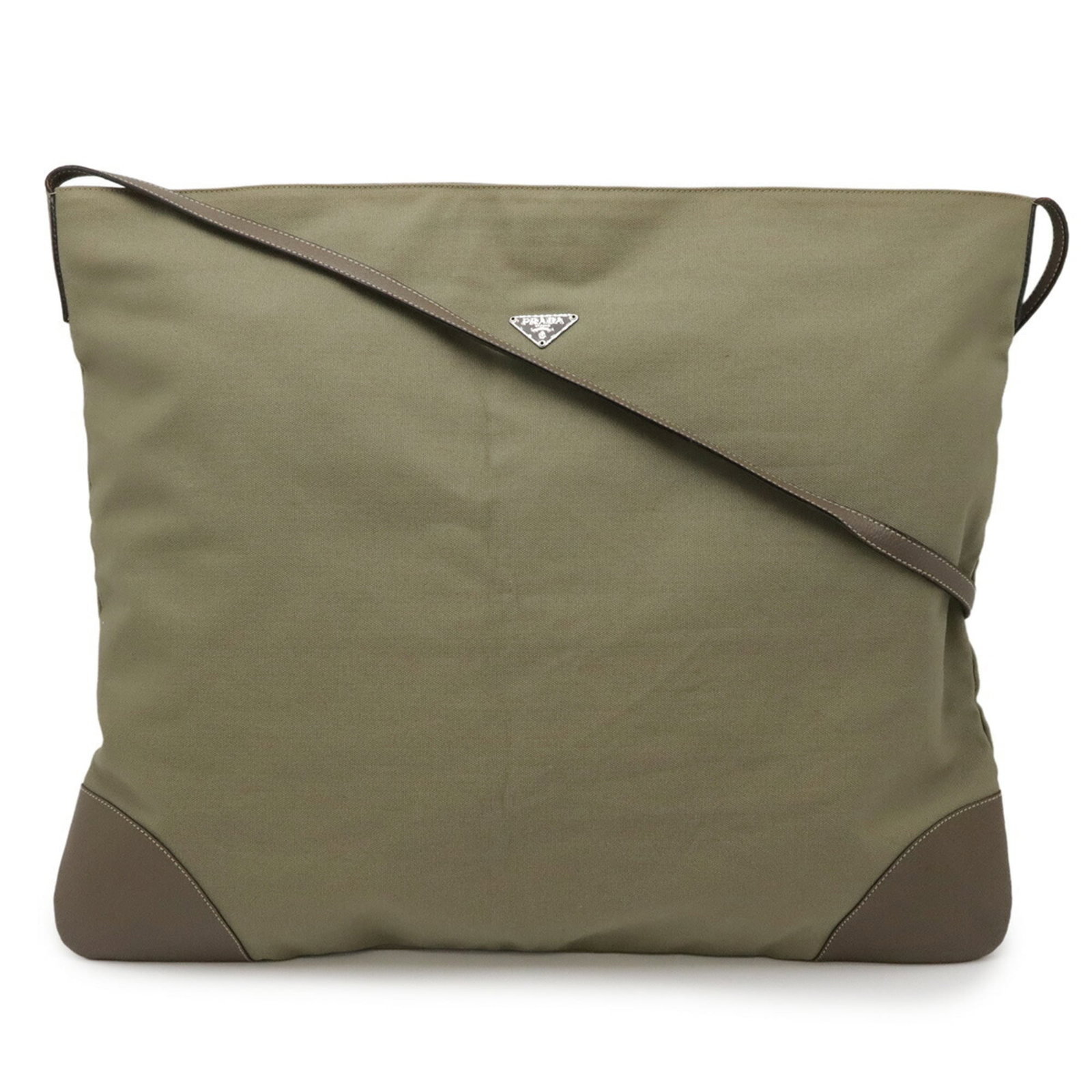 Canvas leather tote bag from Prada: Canvas leather tote bag from Prada Canvas leather tote bag from Prada, featuring a khaki brown color and durable canvas material. The bag's classic design is complemented by the supple leather