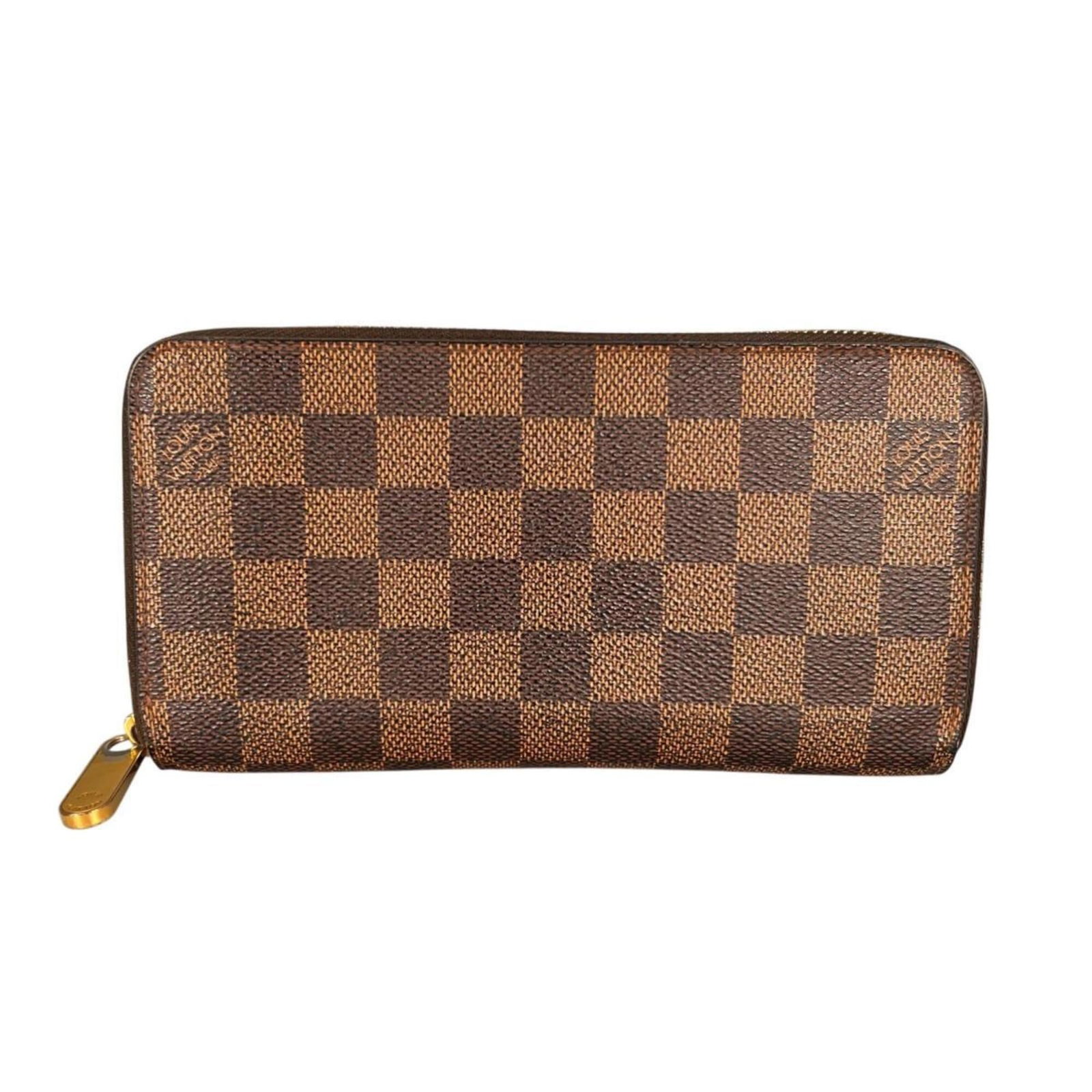 Damier canvas long wallet bi-fold Louis Vuitton: Damier canvas long wallet bi-fold Louis Vuitton Damier canvas long wallet bi-fold from Louis Vuitton, featuring the iconic Damier pattern in brown. This bi-fold wallet measures 10.5cm x 19.5cm x