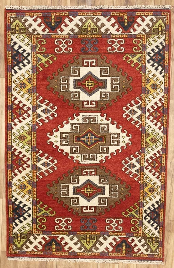 Oriental rug wool carpet pakistan 4x6 ft handmade kazak geometric tribal style: Oriental rug wool carpet pakistan 4x6 ft handmade kazak geometric tribal style Scarlet red and cream hues blend with charcoal tones in this stunning 4x6 ft Kazak geometric tribal style wool carpet,