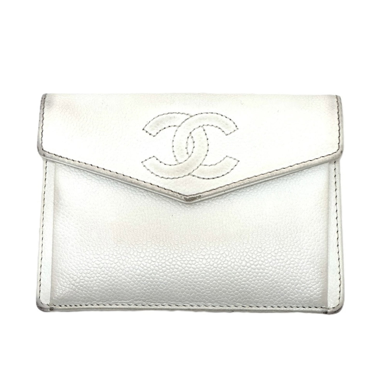 Calfskin wallet bi-fold from Chanel: Calfskin wallet bi-fold from Chanel White Calfskin Bi-Fold Wallet from Chanel. This pre-owned bi-fold wallet features grained calfskin material, white color, and a classic design. With its 11cm x