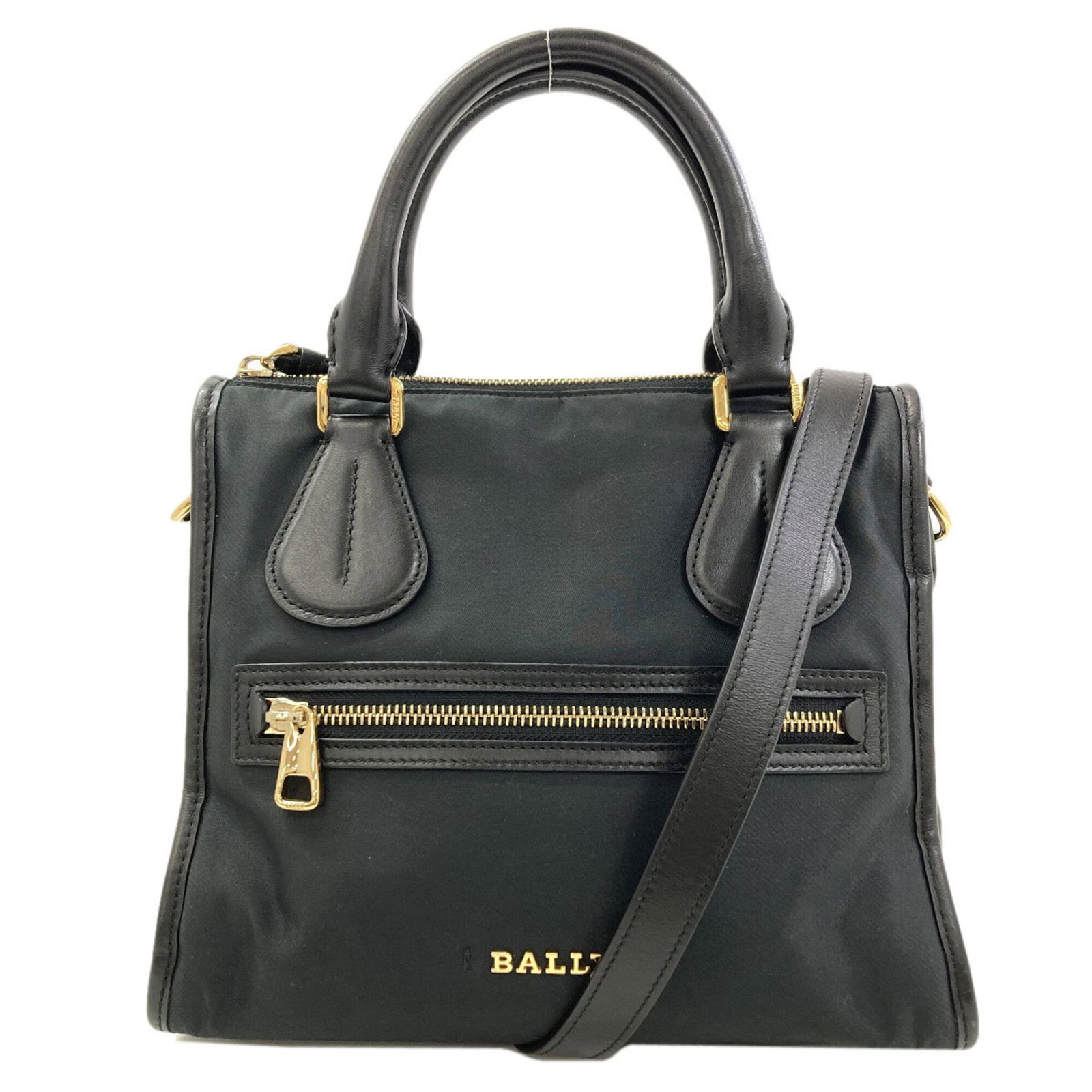 Nylon Bally Handbag: Nylon Bally Handbag Black Nylon Bally Handbag, measuring 21cm x 25cm x 11.5cm, boasts a sleek and modern design with a durable nylon material. With its striking black color and compact size, this