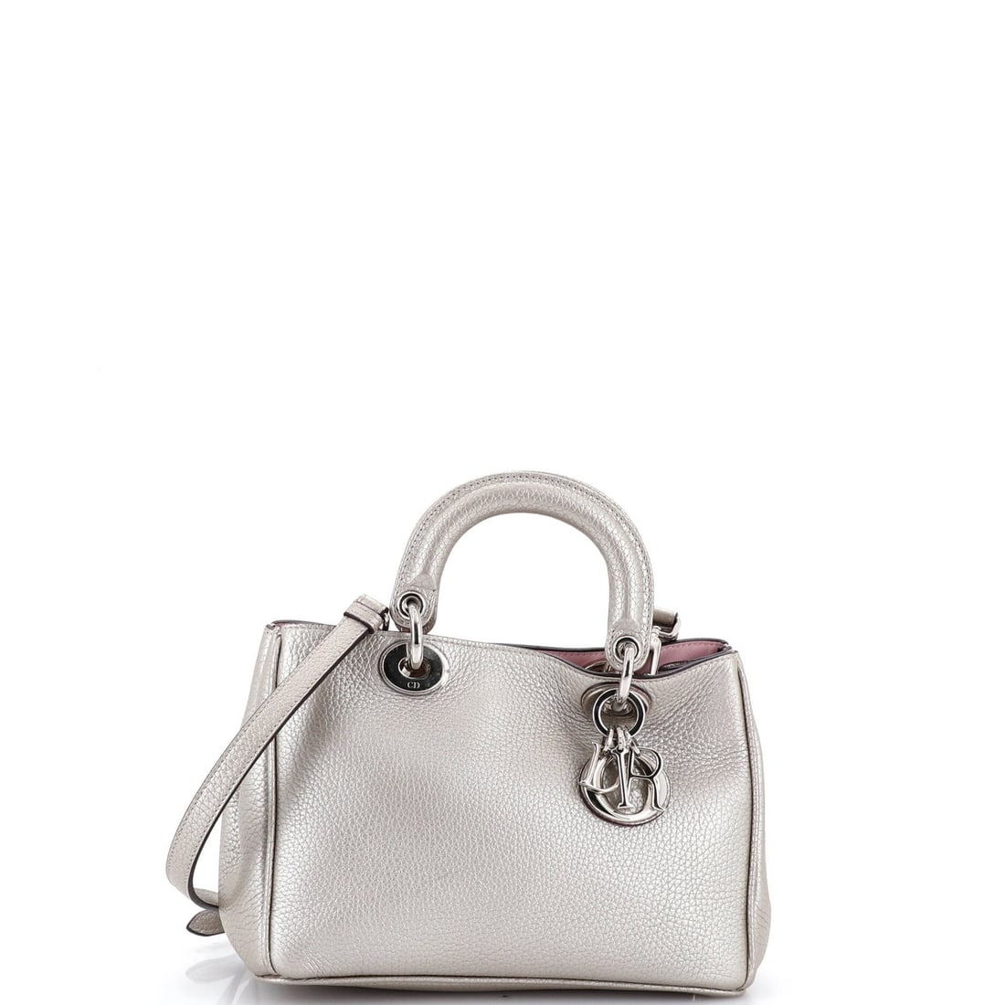 Mini Pebbled Leather Christian Dior Tote: Mini Pebbled Leather Christian Dior Tote Mini Pebbled Leather Christian Dior Tote in Metallic Silver, featuring pebbled leather exterior with silver hardware and pink interior. Measuring 6.5" high,