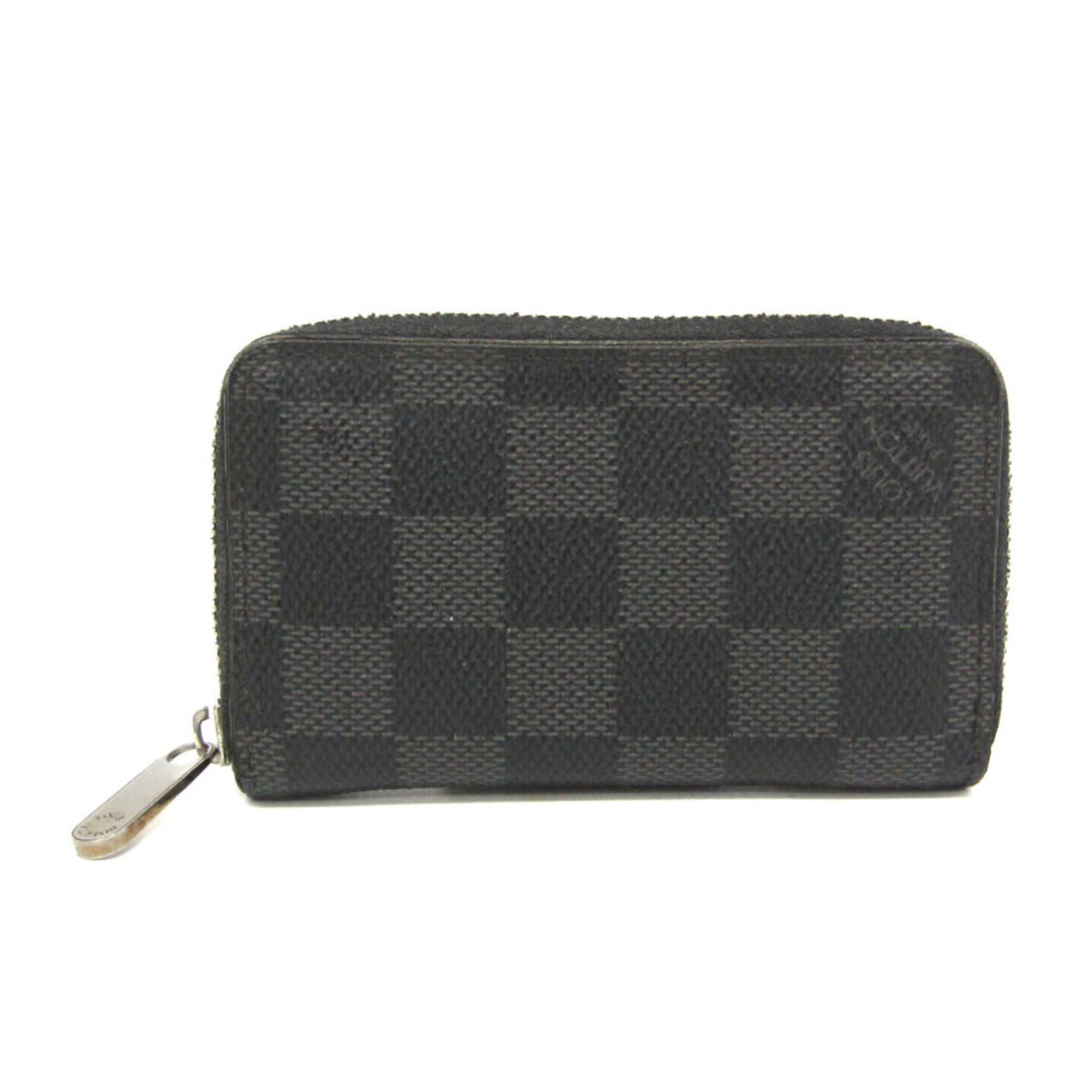 Louis Vuitton Coin Purse/ Coin Case Damier Graphite: Louis Vuitton Coin Purse/ Coin Case Damier Graphite Damier Graphite Louis Vuitton Coin Purse features a classic design with a black Damier Graphite pattern, zip closure, and multiple storage