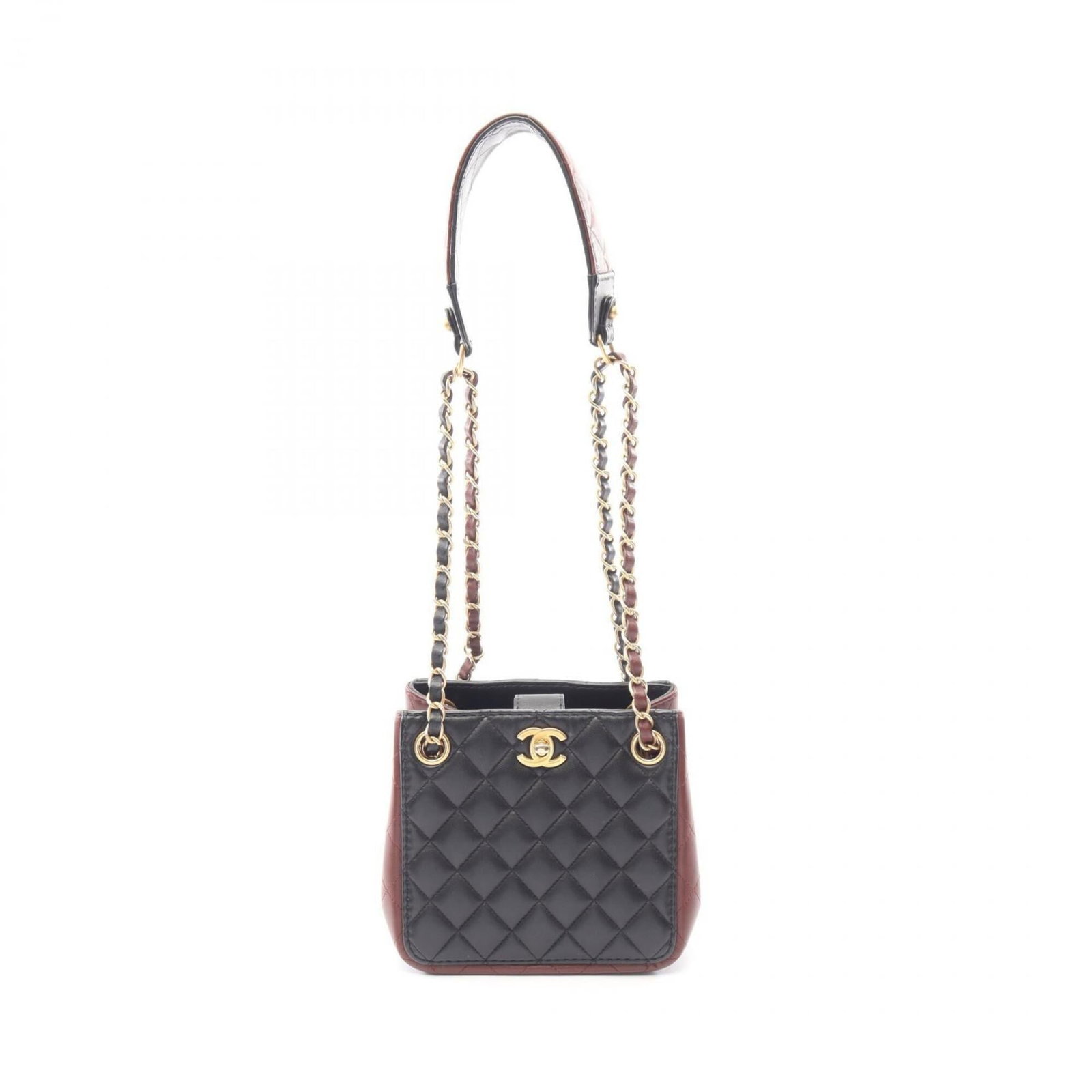 Chanel Handbag Shoulder Bag Leather: Chanel Handbag Shoulder Bag Leather Black and Brown Leather Chanel Shoulder Bag with Lambskin Material. This used, very good condition shoulder bag features a classic design with a few traces of