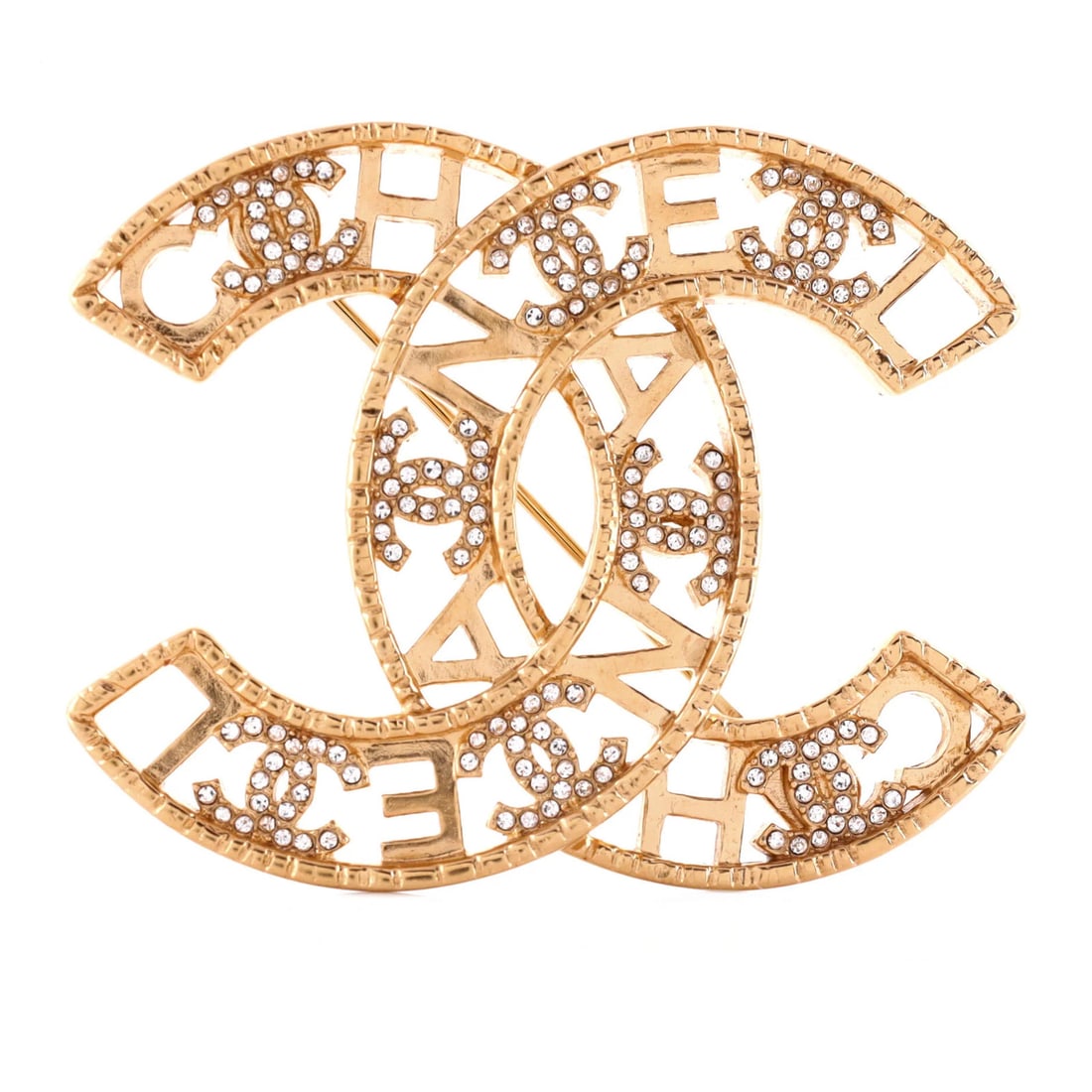 Chanel Cut Out CC Logo Letter Brooch Metal with Crystals: Chanel Cut Out CC Logo Letter Brooch Metal with Crystals The Chanel Cut Out CC Logo Letter Brooch Metal with Crystals boasts a striking gold finish and intricate crystal details, showcasing the