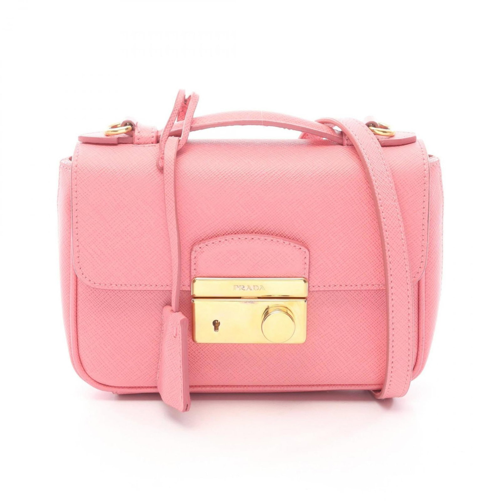 Prada Handbag Saffiano Triangle: Prada Handbag Saffiano Triangle Saffiano Triangle in pink, a versatile and stylish handbag from Prada. With its durable Saffiano material and compact size, it's perfect for everyday use. Traces of