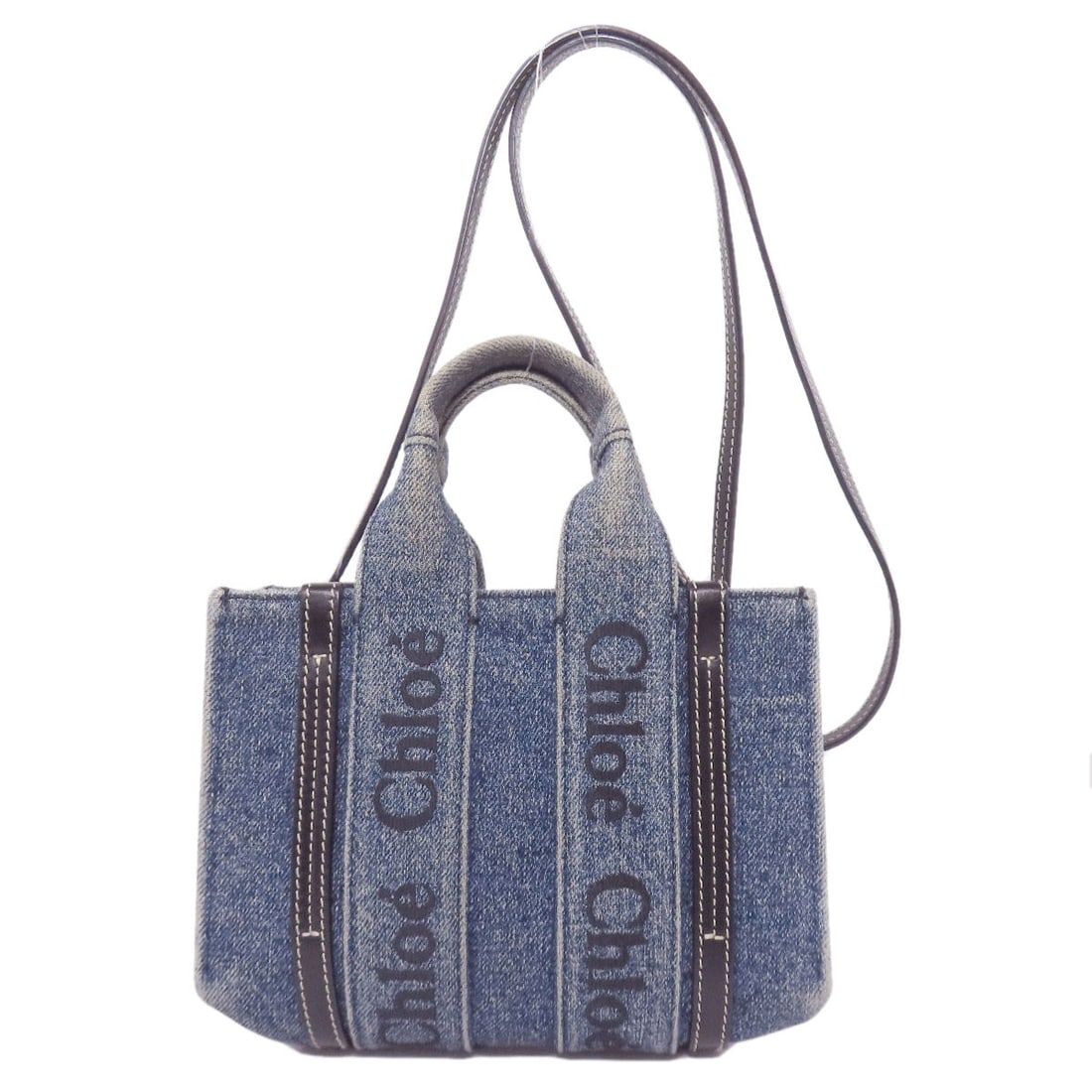 Woody Chloe Mini 2Way Handbag Calf Denim: Woody Chloe Mini 2Way Handbag Calf Denim Blue Chloe Mini 2Way Handbag with Calf Denim Exterior. This CHLOE handbag features a stylish 2-way design and exterior made from durable calf denim. The blue c