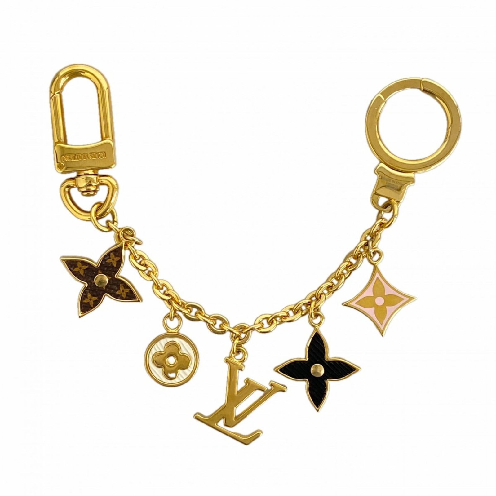 Keyring from Louis Vuitton: Keyring from Louis Vuitton Gold and Multi-Color Louis Vuitton Keyring, measuring 20cm x 3cm x 5.00mm, features a distinctive design with traces of usage visible due to scratches and dirt. The keyring