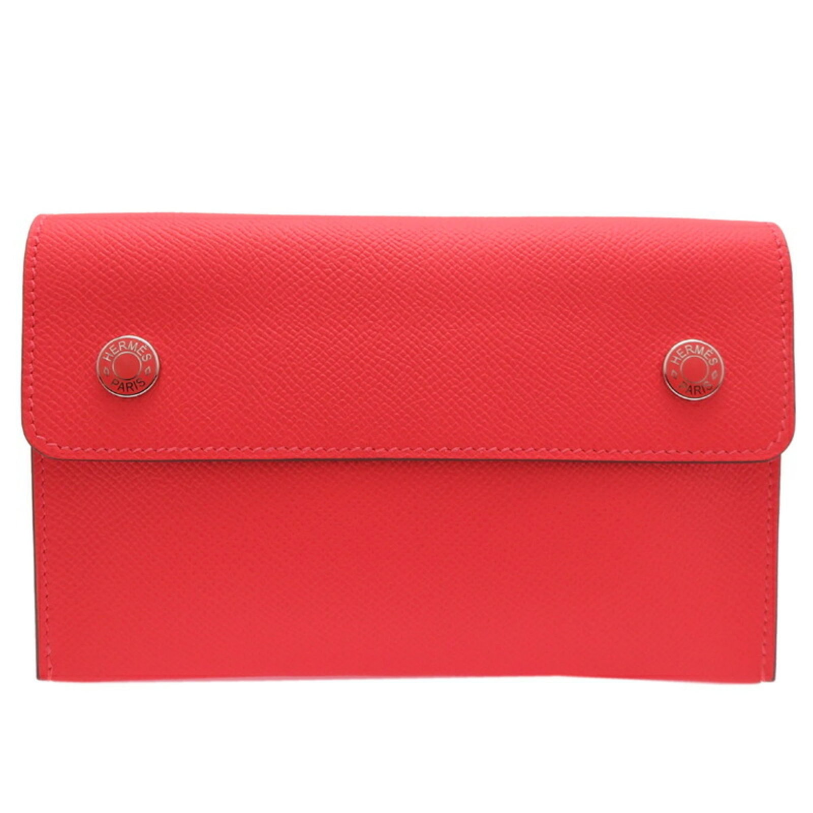 Epsom leather shoulder bag by Hermes: Epsom leather shoulder bag by Hermes Epsom leather shoulder bag by Hermes, featuring vibrant orange color and sleek design. This opened, never-used bag measures 11.5cm x 18cm x 3.5cm, showcasing its c