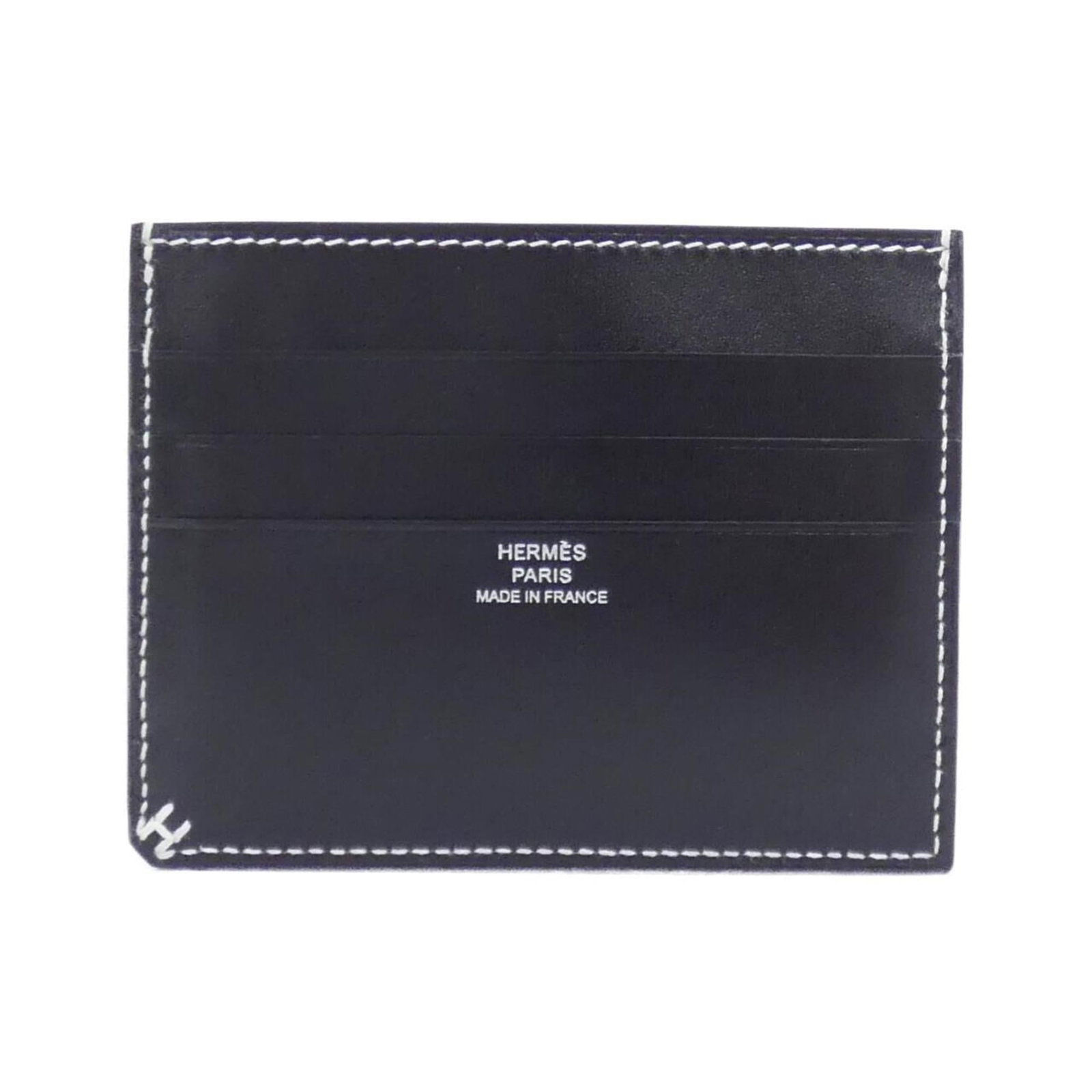 Hermes Card Case Leather: Hermes Card Case Leather Box calf leather card case from Hermes in black, bearing some scratches and minor wear, with a few traces of usage. Made from high-quality leather, this card case features