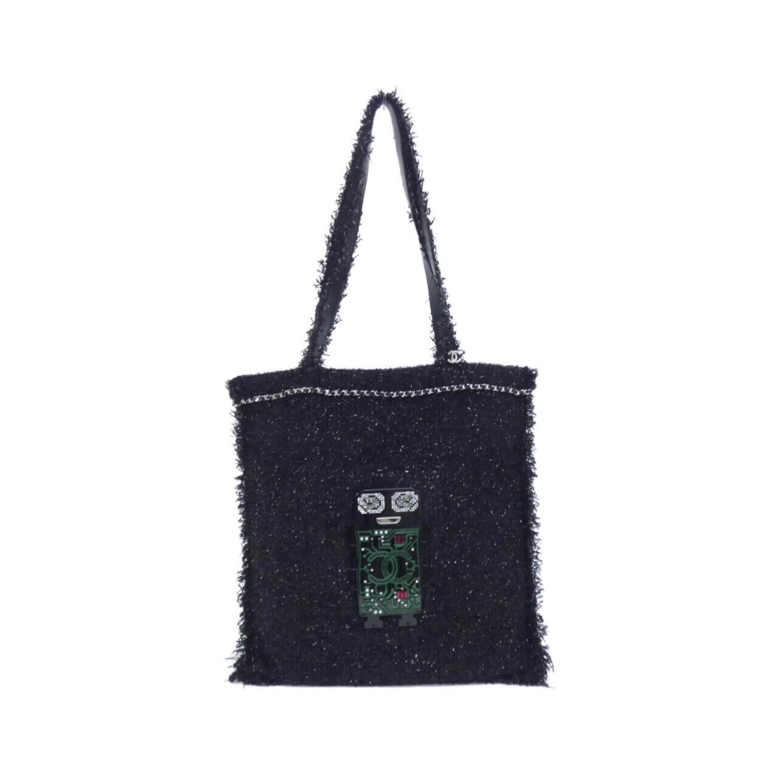 Tweed Handbag by Chanel: Tweed Handbag by Chanel Tweed Handbag by Chanel features a timeless design with a black and green tweed exterior, adorned with silver hardware. Measuring 40cm x 36cm x 1cm, this compact handbag is